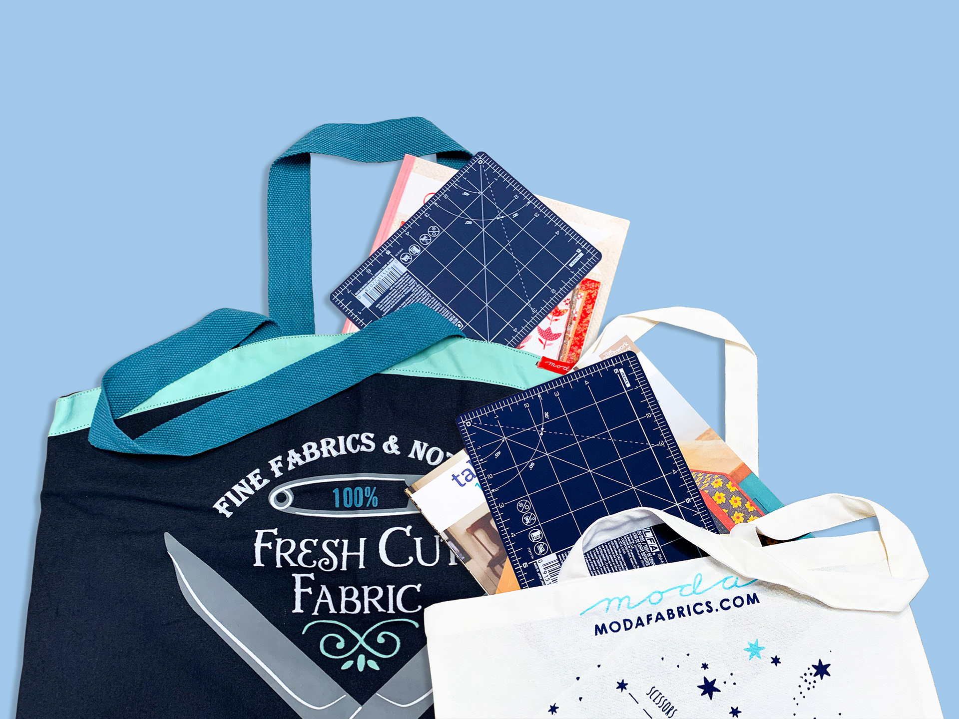 Original photography of sewing supplies edited for an eye-catching ad about an in-store giveaway event.