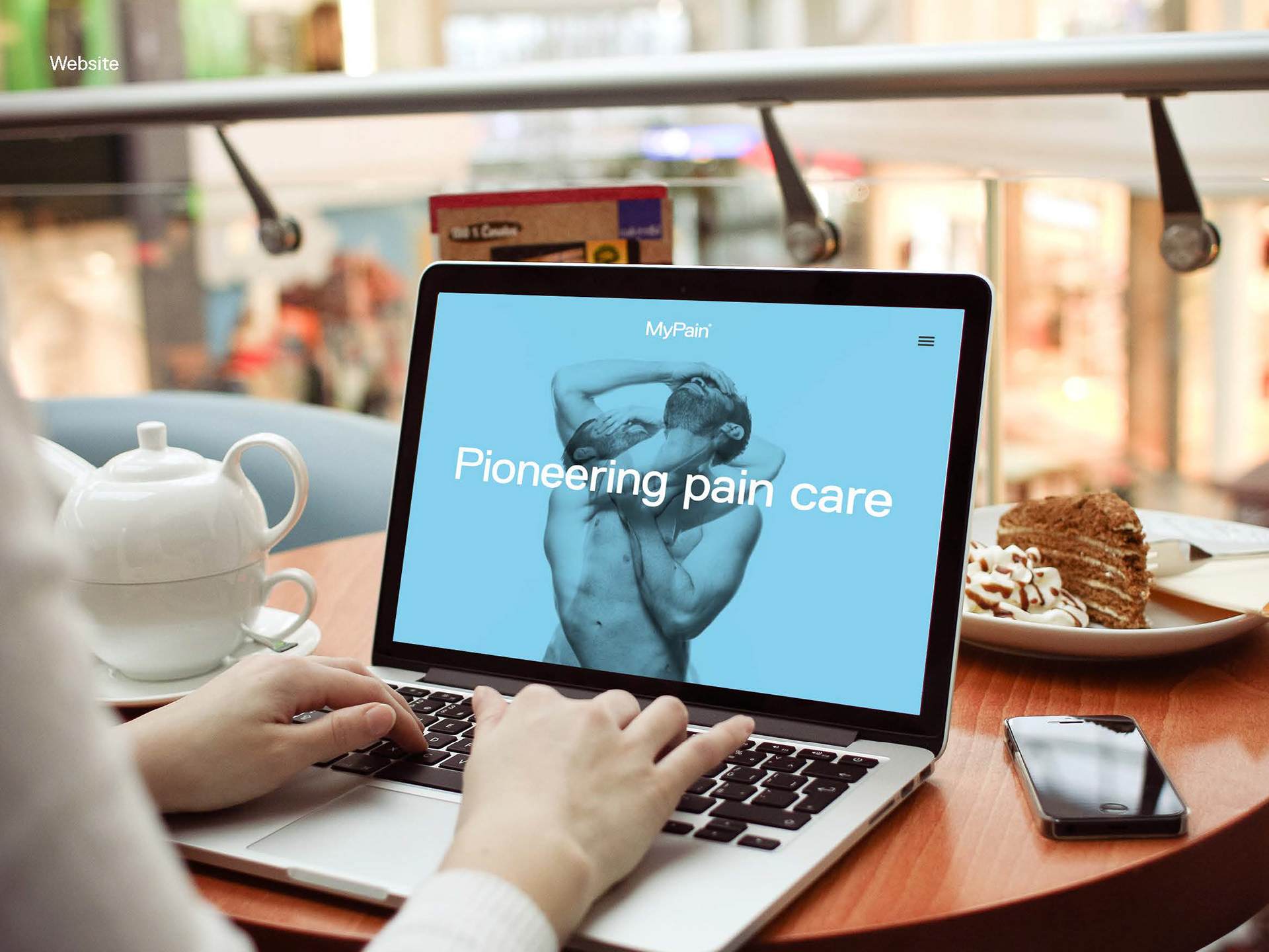Screen showing a naked male model and saying pioneering pain care