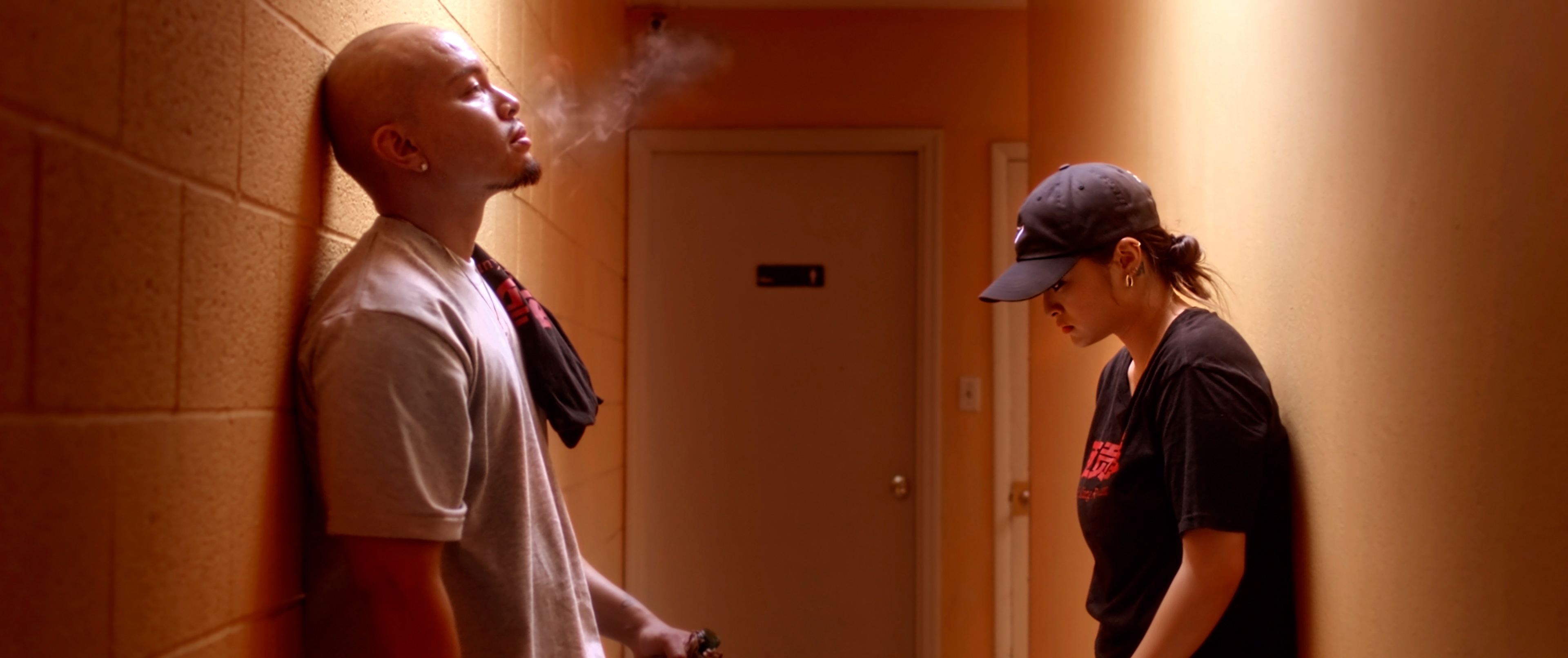 Brother (Lorin Ly) and Sister (Hedy Wong) Reminisce in Hallway
