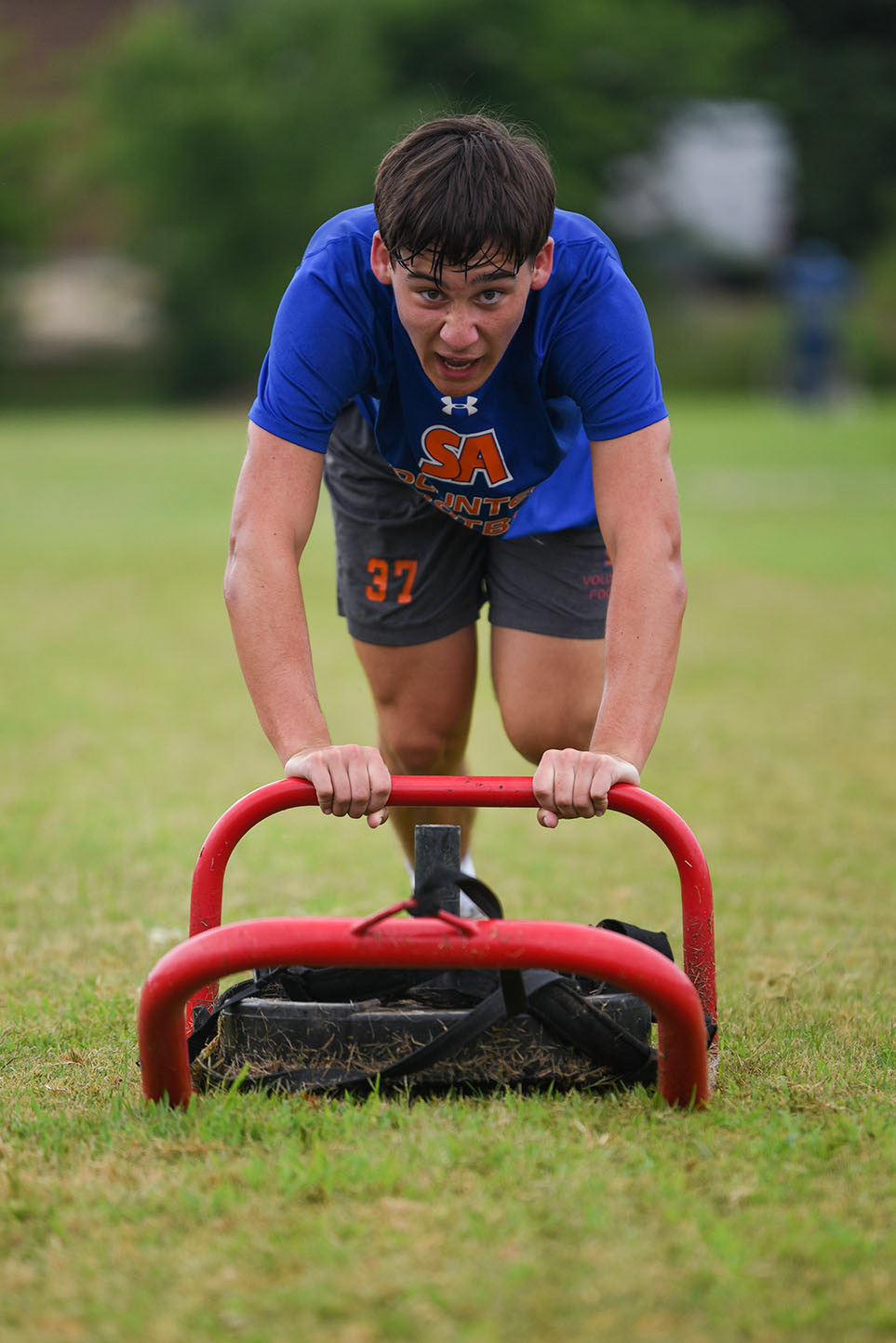 Cy Hallberg, 15, runs forward as fast as he can while pushing a weight during football practice on Thursday, June 4, 2020 at Starkville Academy. Hallberg has been playing football since he was in fifth grade, and he’s now entering tenth grade. Despite COVID-19, Hallberg said he’s hopeful that they will have a full season.