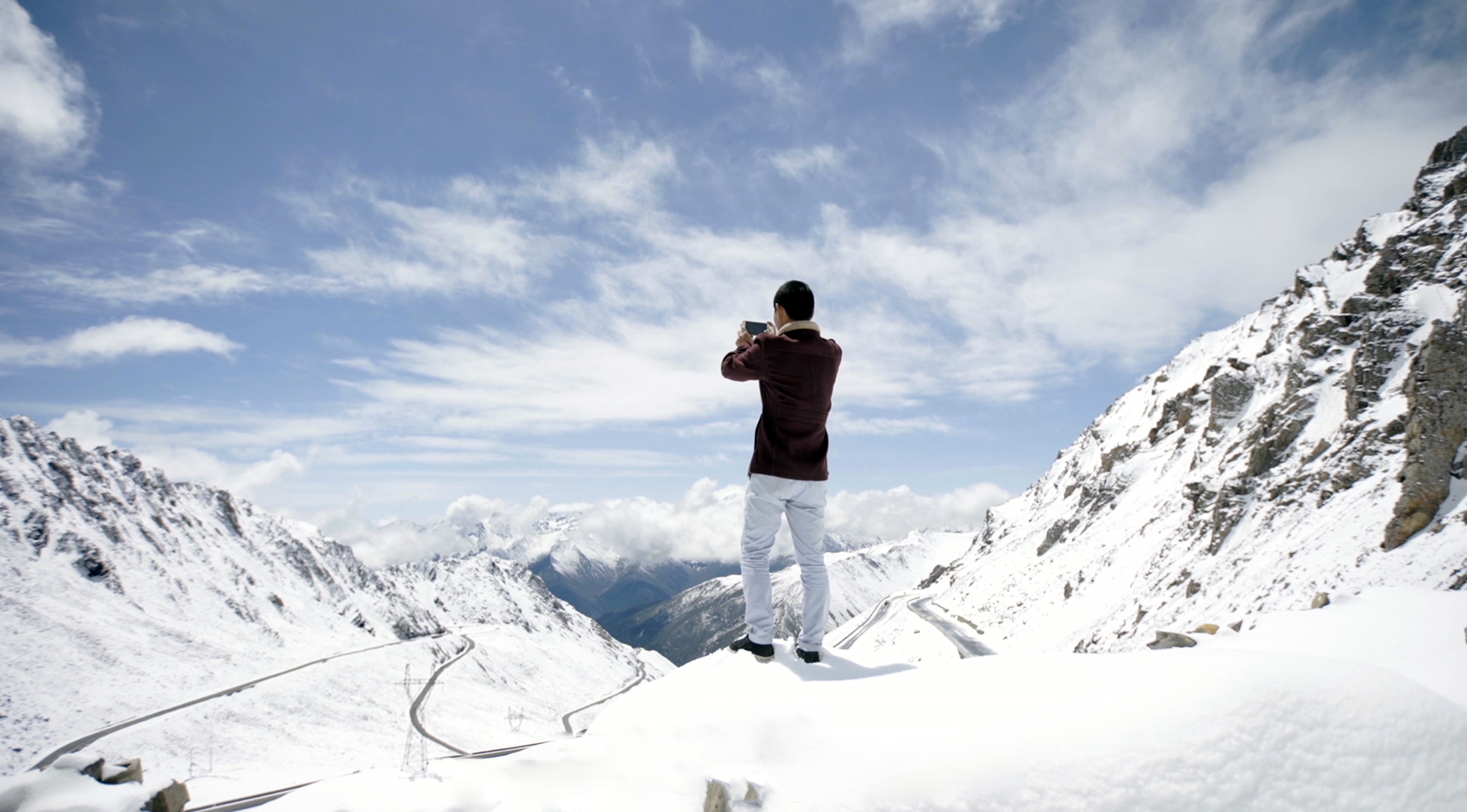 Drone shot of the truck drivers in the mountains of china. Inspirational and emotional content film.
