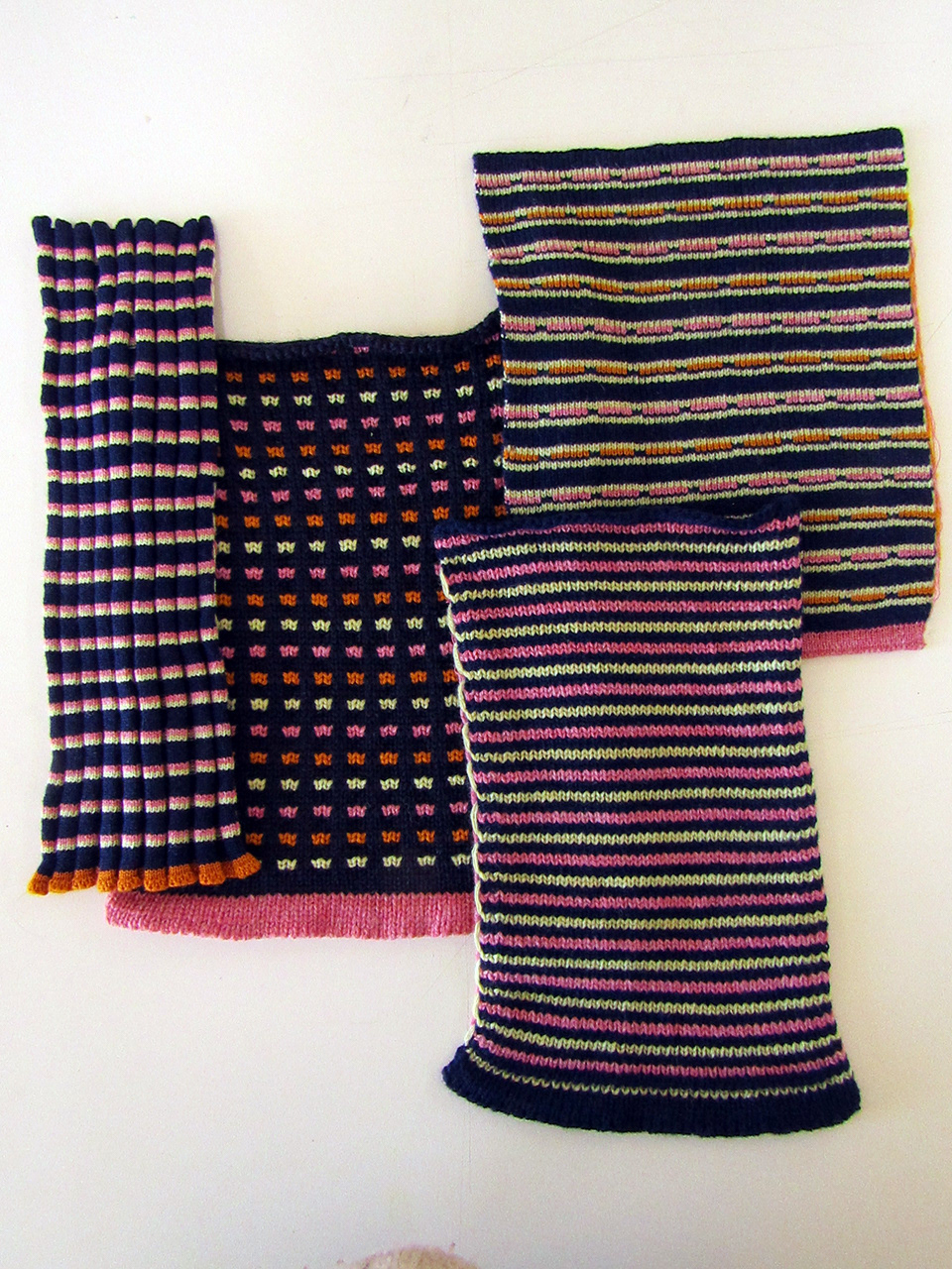 Collection two - adding the rib and 3.5 gauge holding stitch breaks up stripping in the other two samples.