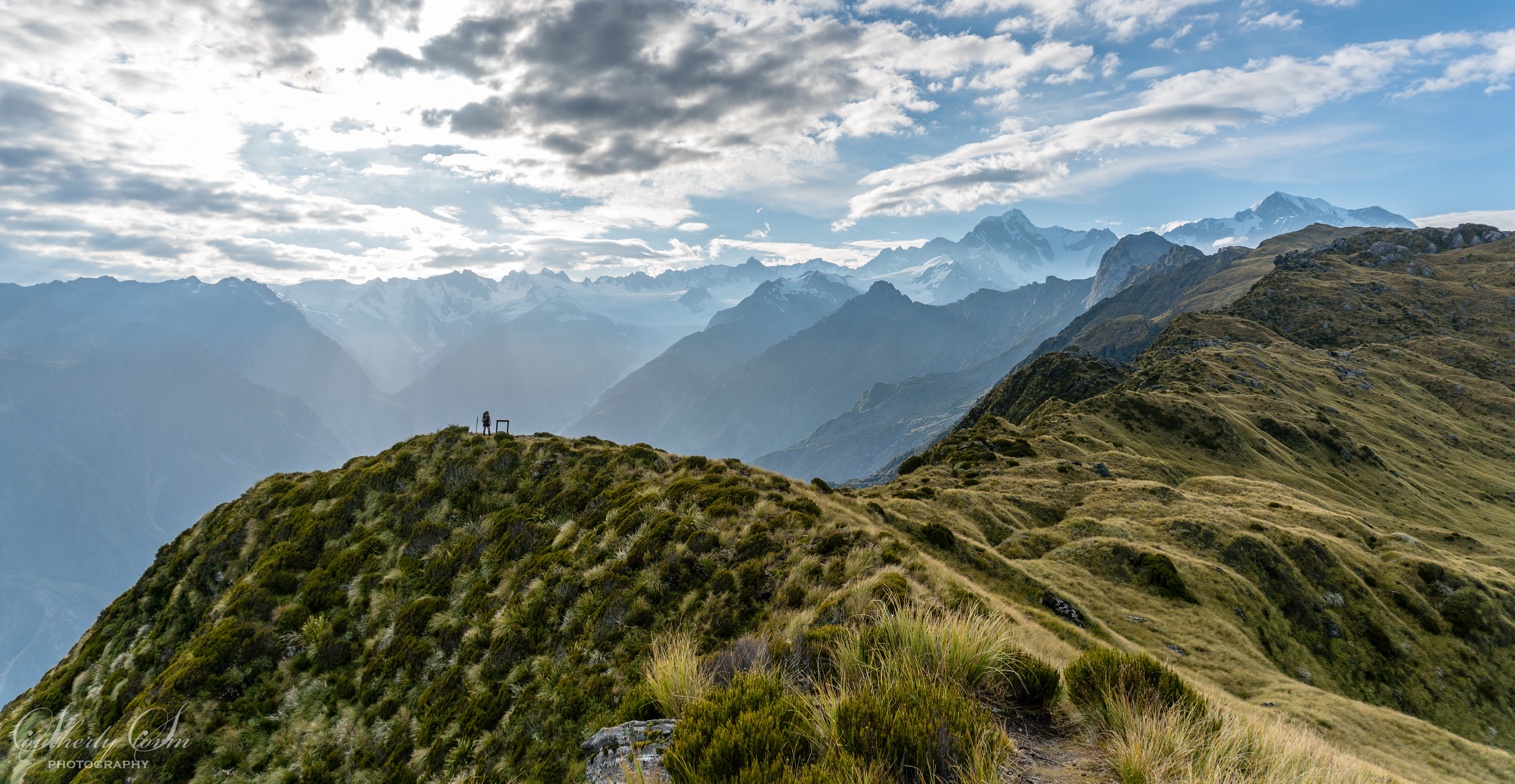 Tramper admires the Southern Alps