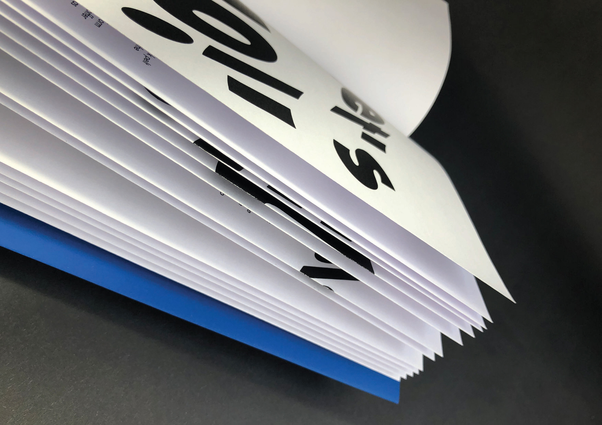 French fold pages allows type to flow over and around the pages