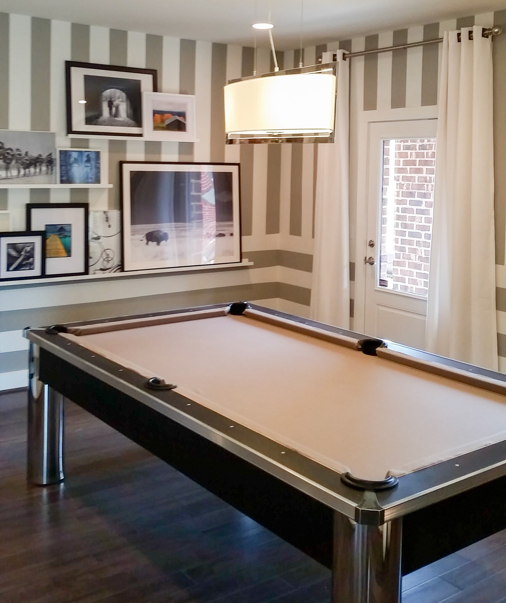 Personal Selections: Flooring & lighting. Other selections made by Model Home Interiors.