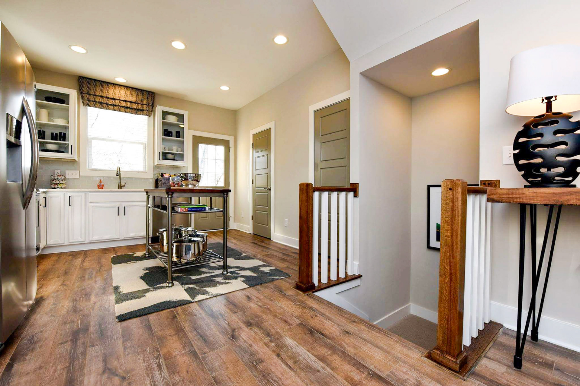 Personal Selections: Tile, flooring, and lighting. Other selections made by Model Home Interiors. Photo Credit: Stanley Martin Homes.