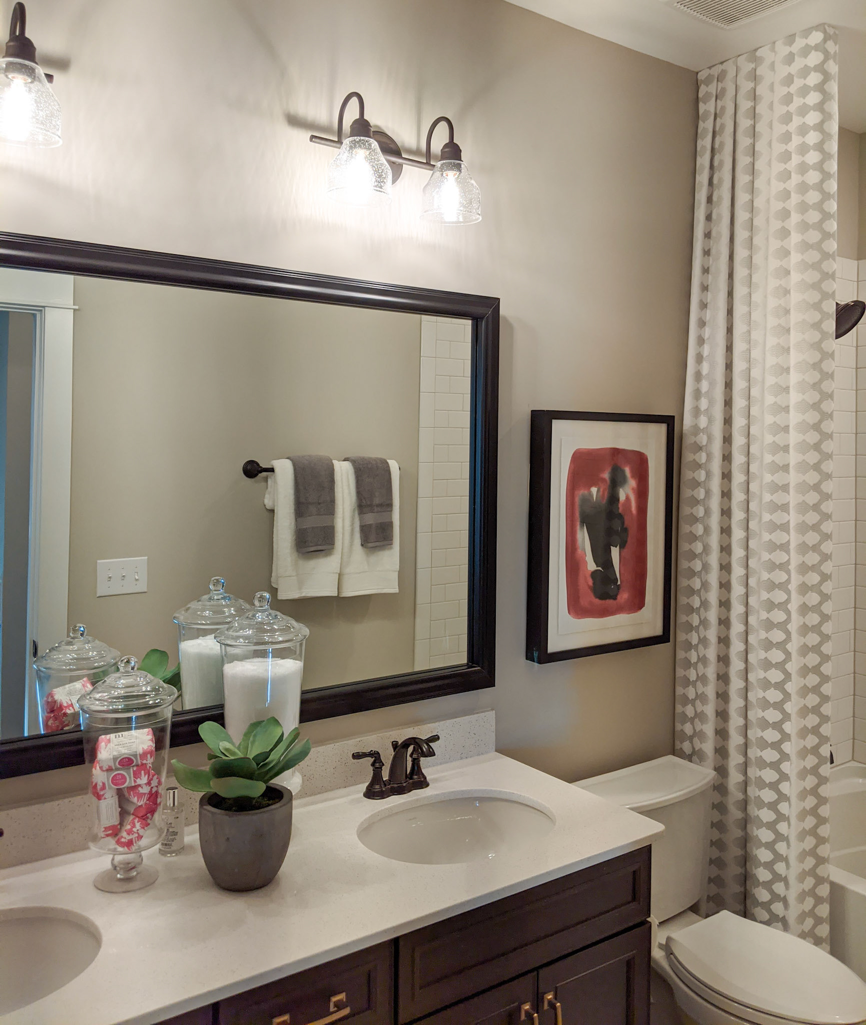 Personal Selections: Cabinets, counter top, hardware, plumbing, tile, and lighting. Other selections made by Model Home Interiors.