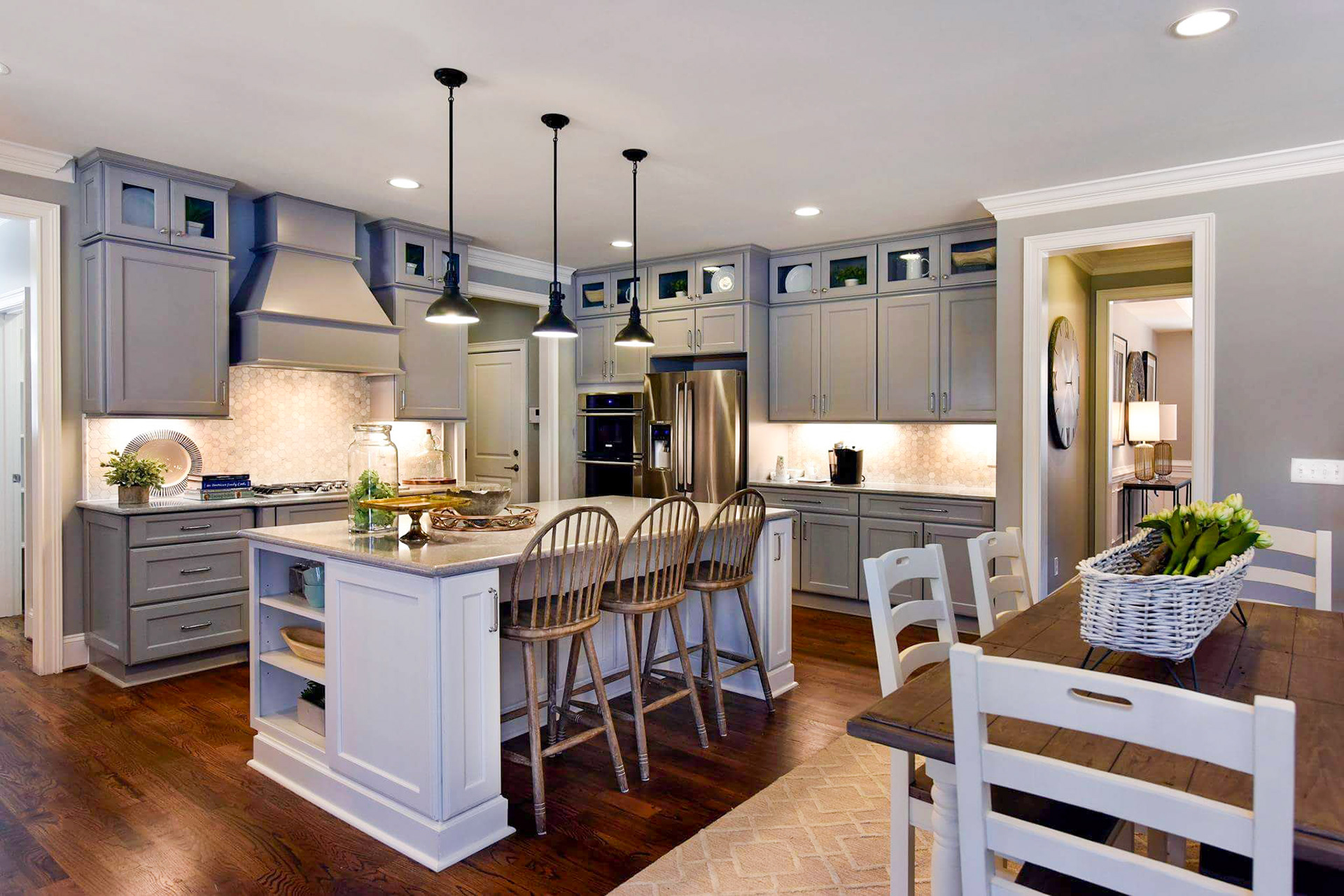Personal Selections: Tile, flooring, and lighting. Other selections made by Merchandising Concepts. Photo Credit: Stanley Martin Homes.