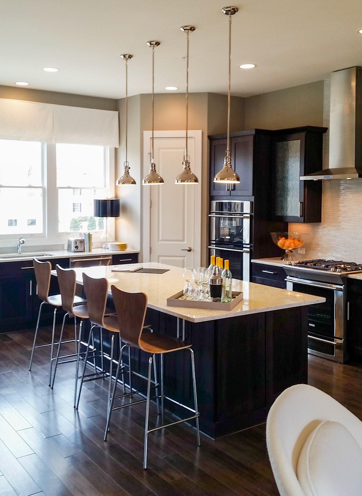 Personal Selections: Tile, flooring, and lighting. Other selections made by Model Home Interiors.