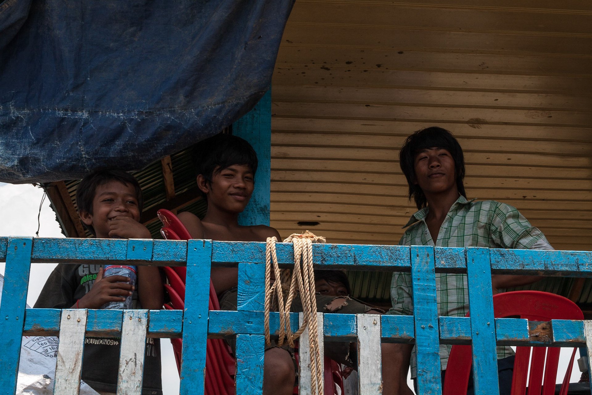 Some very confident looking young locals in a fishing village near Tonle Sap Lake