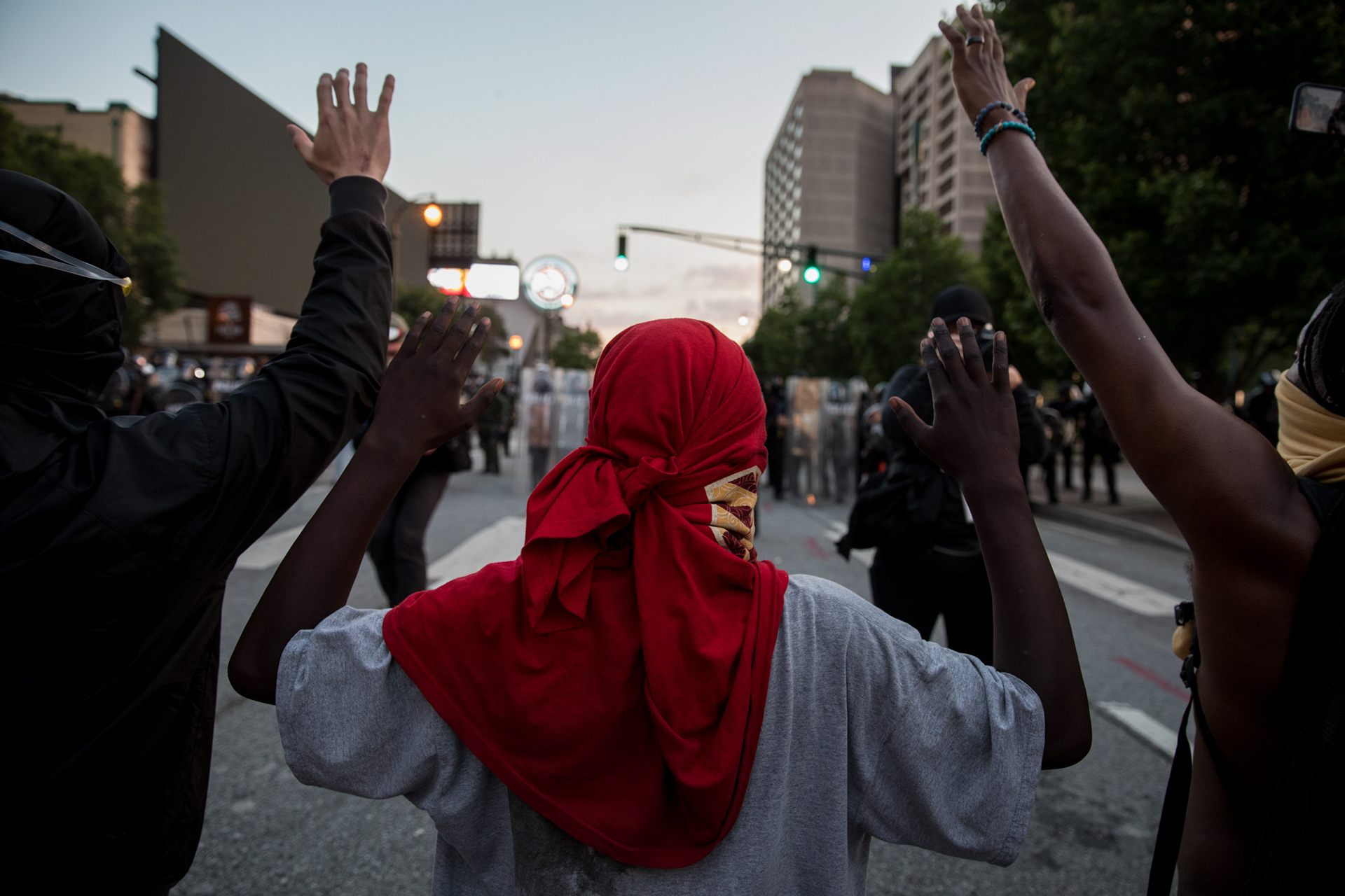 Protesters hold up their hands in front of law enforcement in downtown Atlanta on May 31.