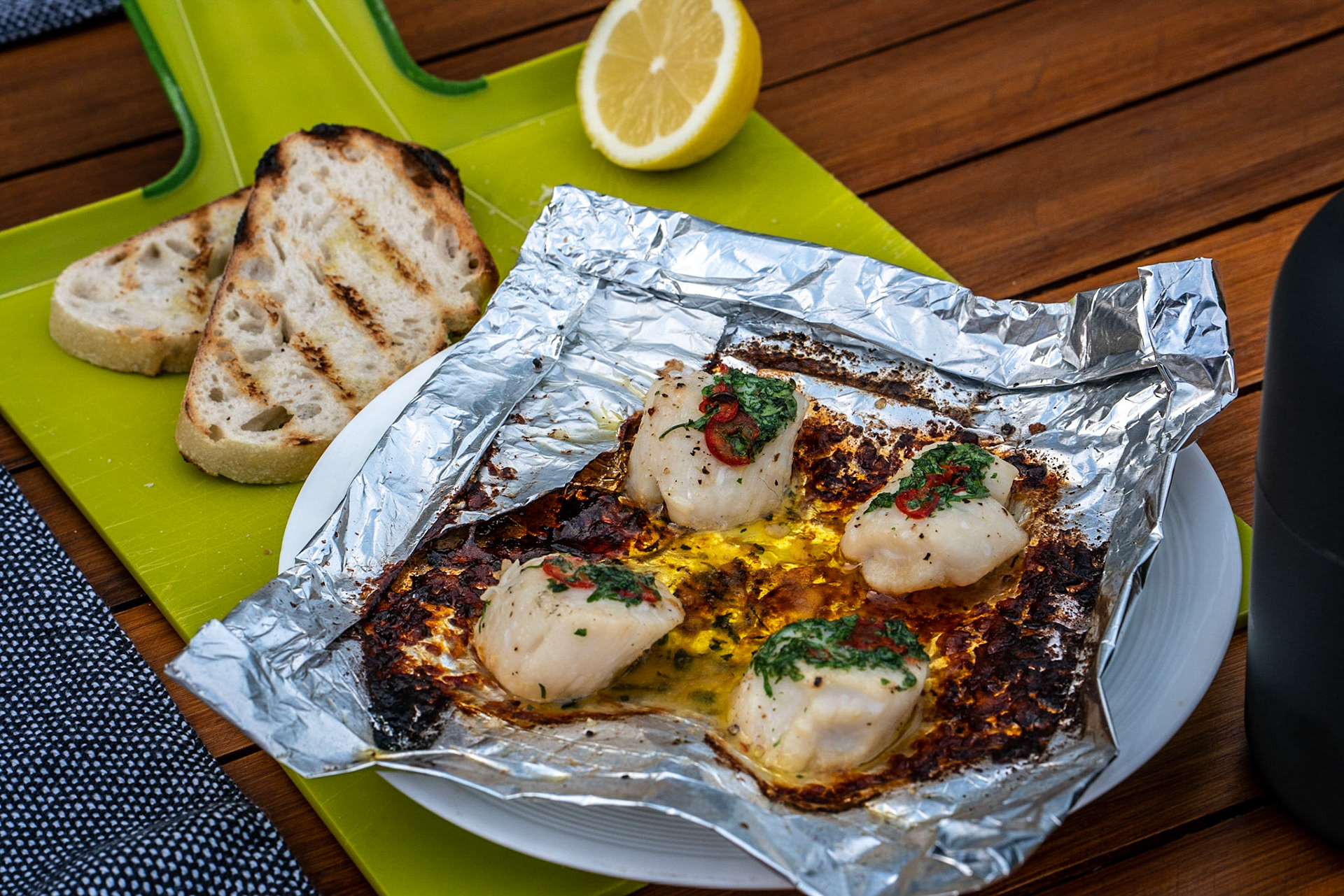 BBQ'd scallops with parsely and chilli butter