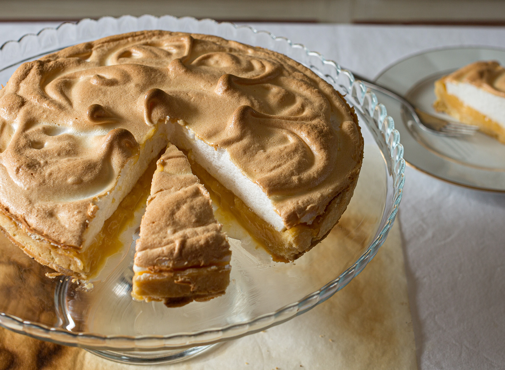 Fotografia de tarte de limão merengada