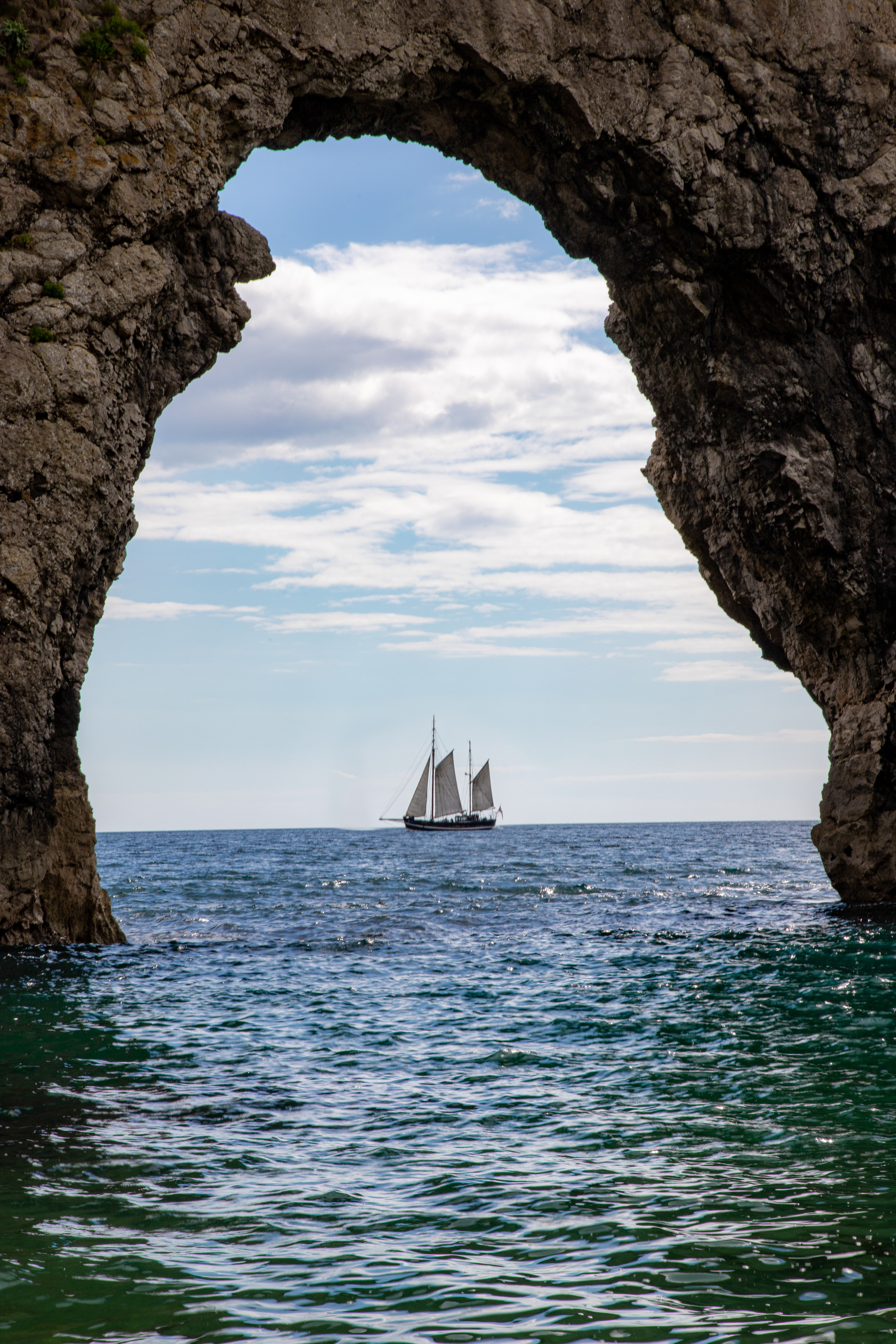 Boat framed in Durdle Door