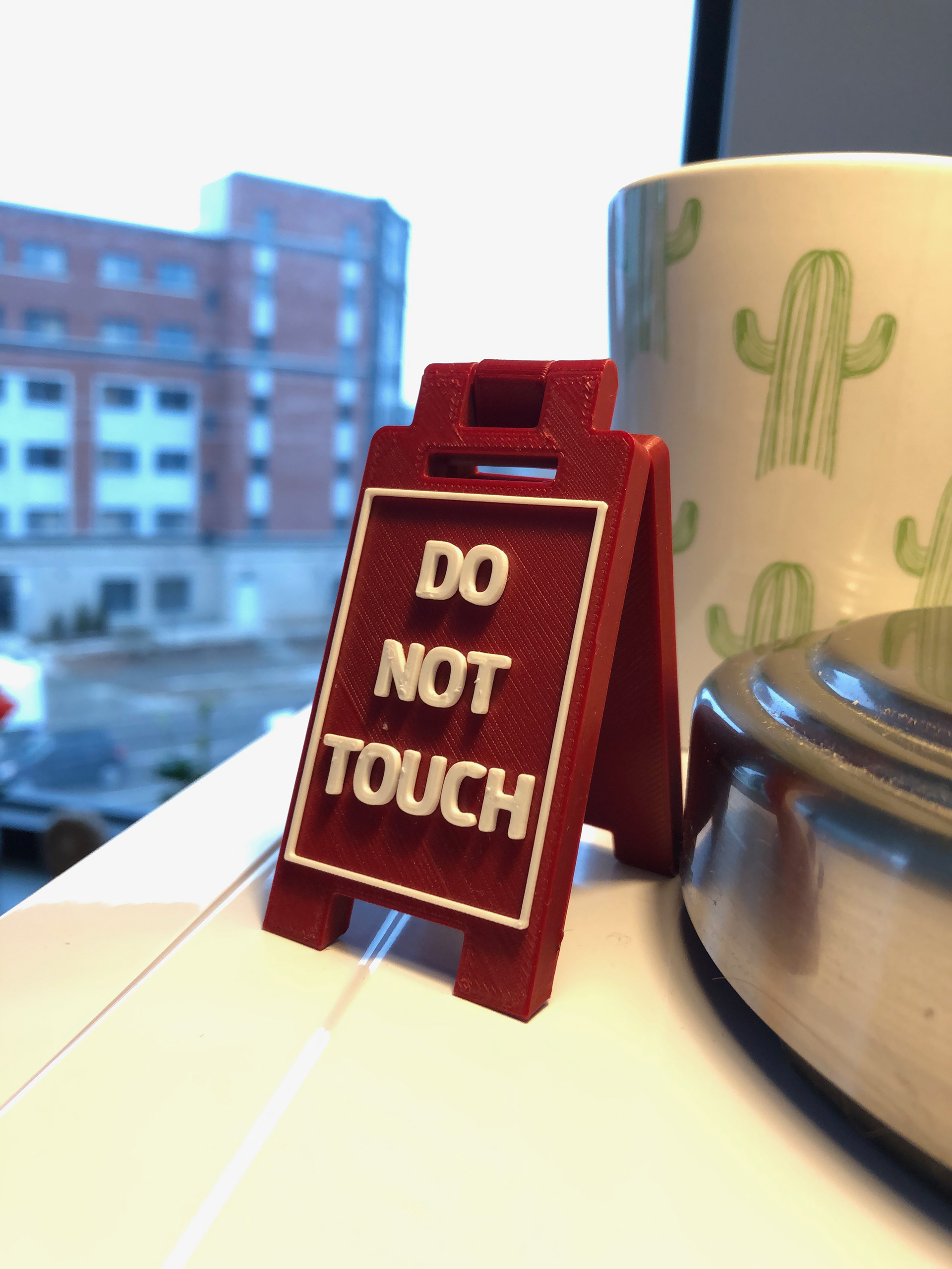 "Do Not Touch" office sign
