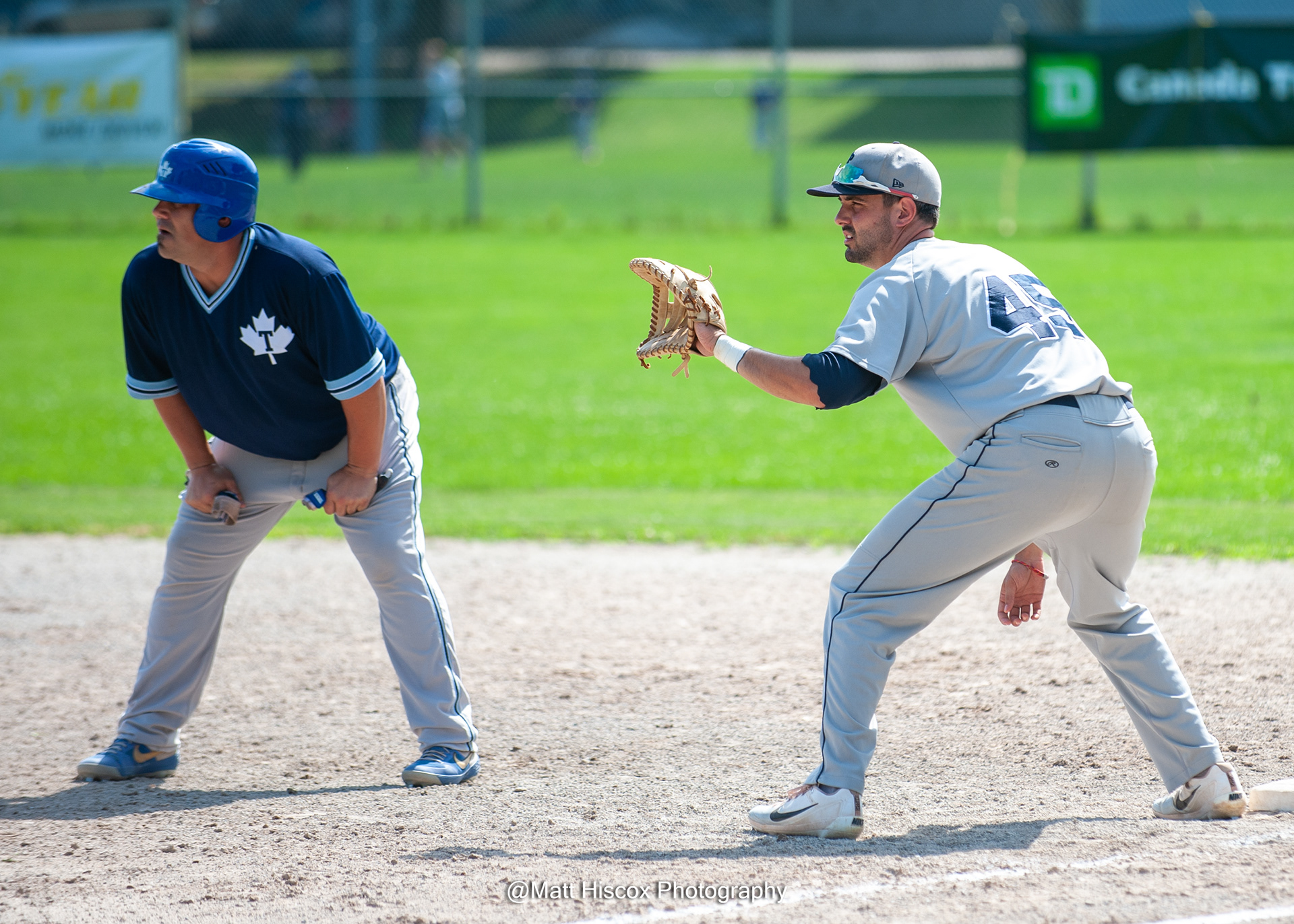 Evan Britt holds a runner on