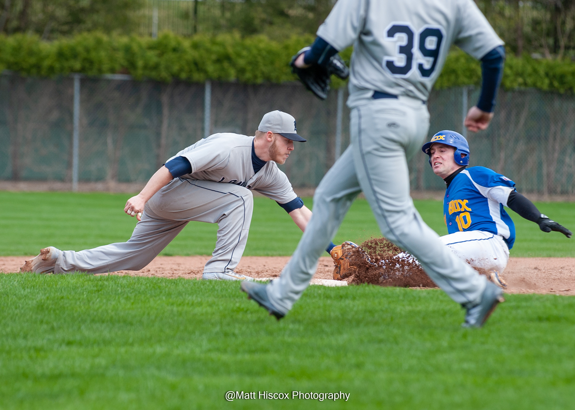 Mike Ambrose applies the tag
