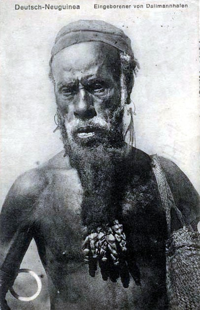 Man from Dallmannhafen, Sepik coastal region. German New Guinea. Postcard.1914. Back with wet stamp of the Mission Printing Office.