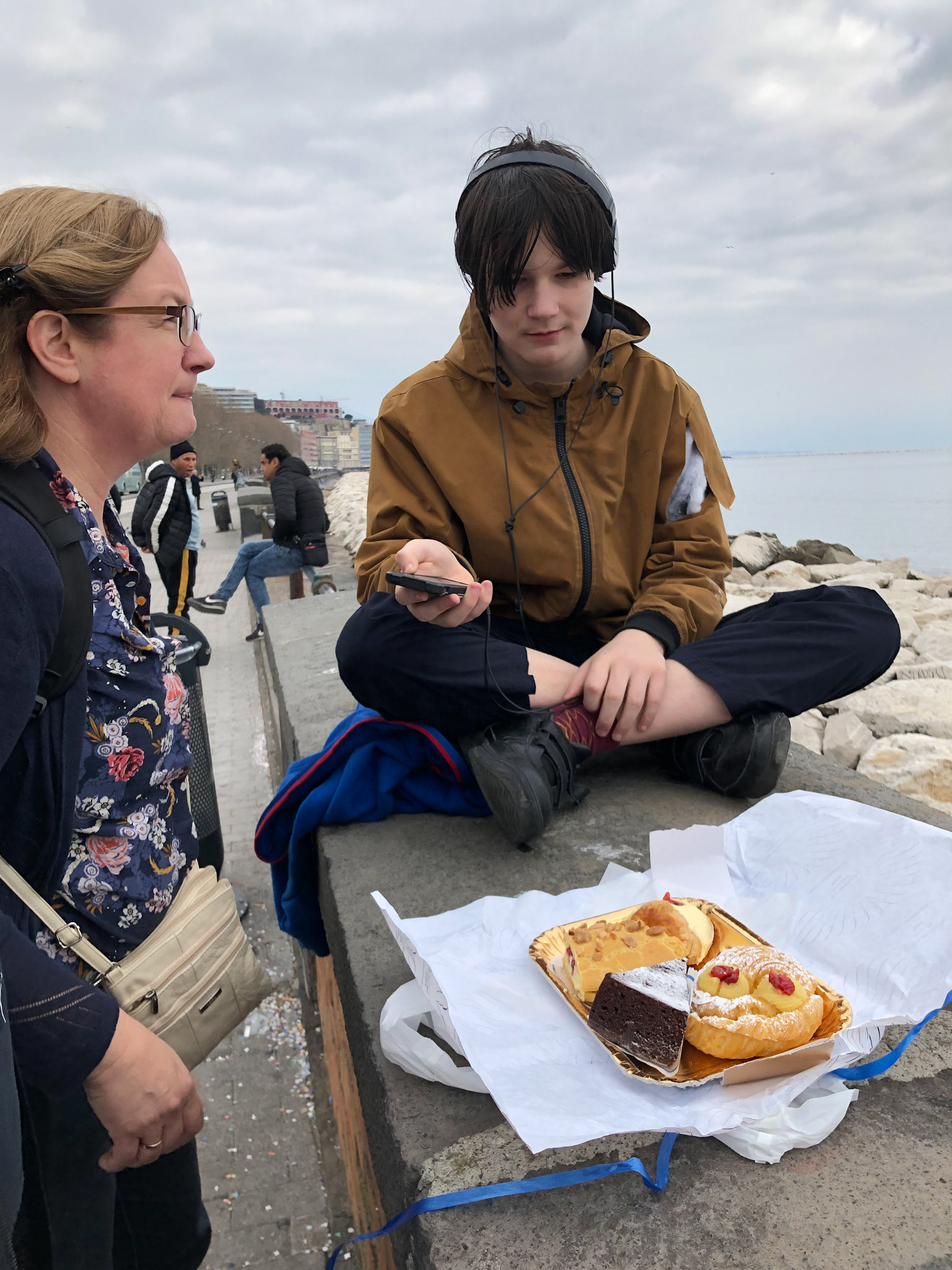 Enjoying cakes by the sea