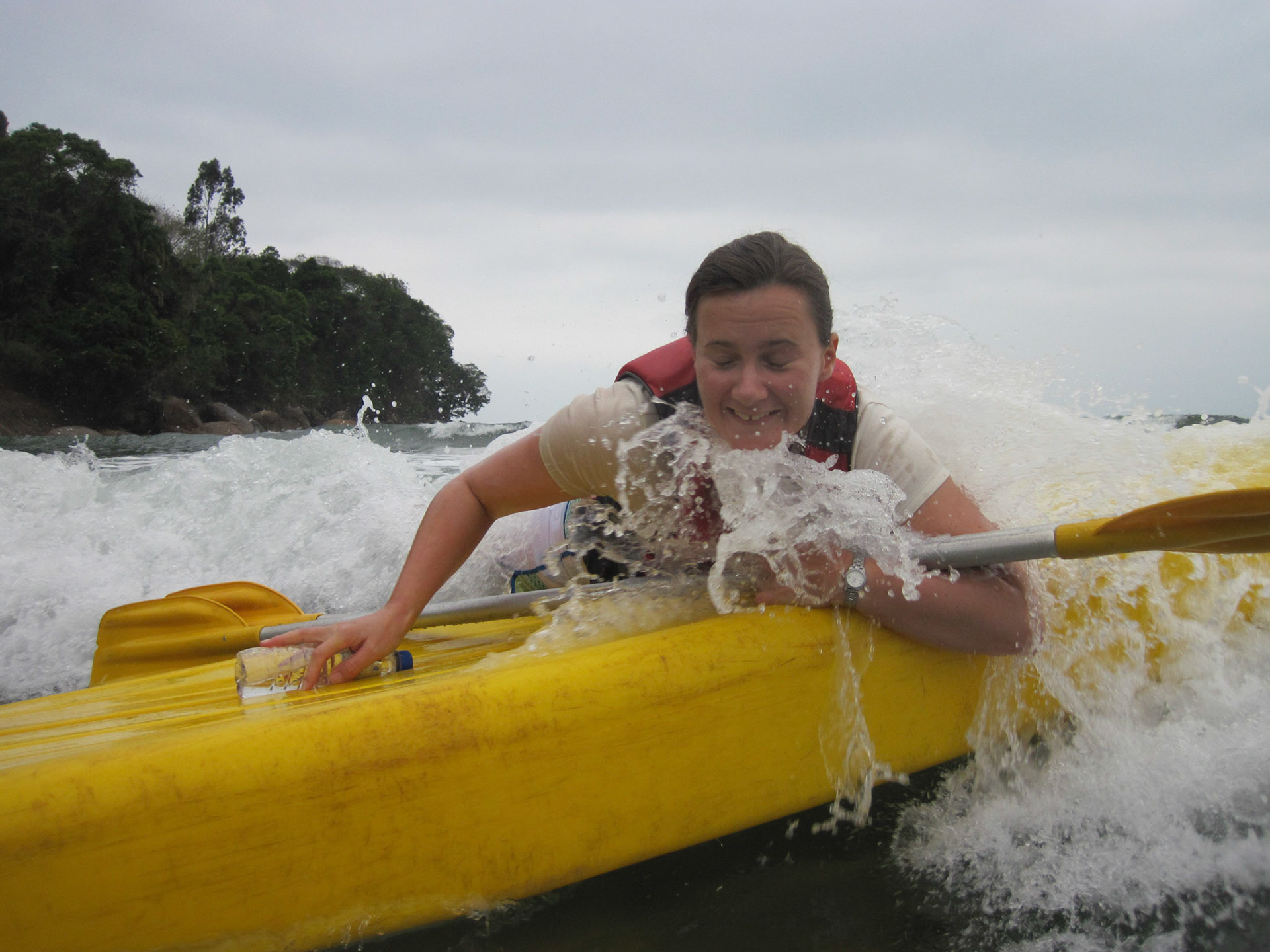 You're not supposed to surf on an up-turned kayak!