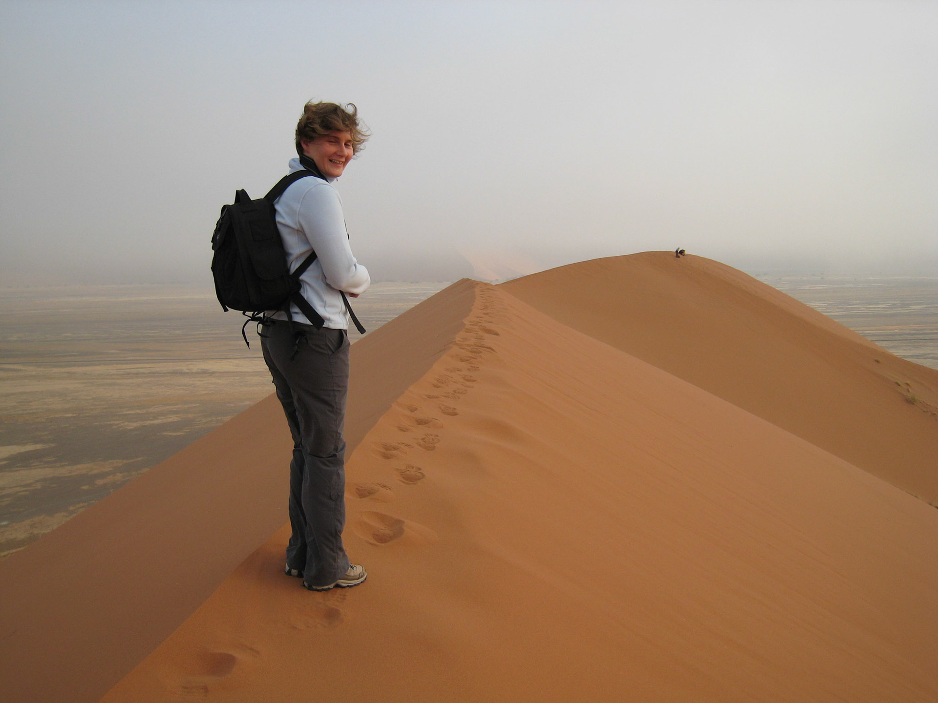 Sue on top of Dune 45, in the fog