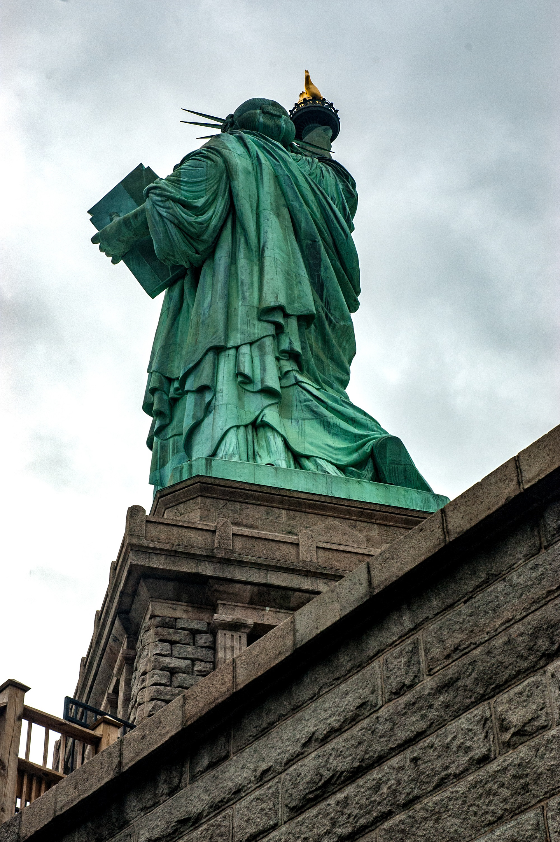 Behind Lady Liberty. New York. ©2005, Corey Sandler