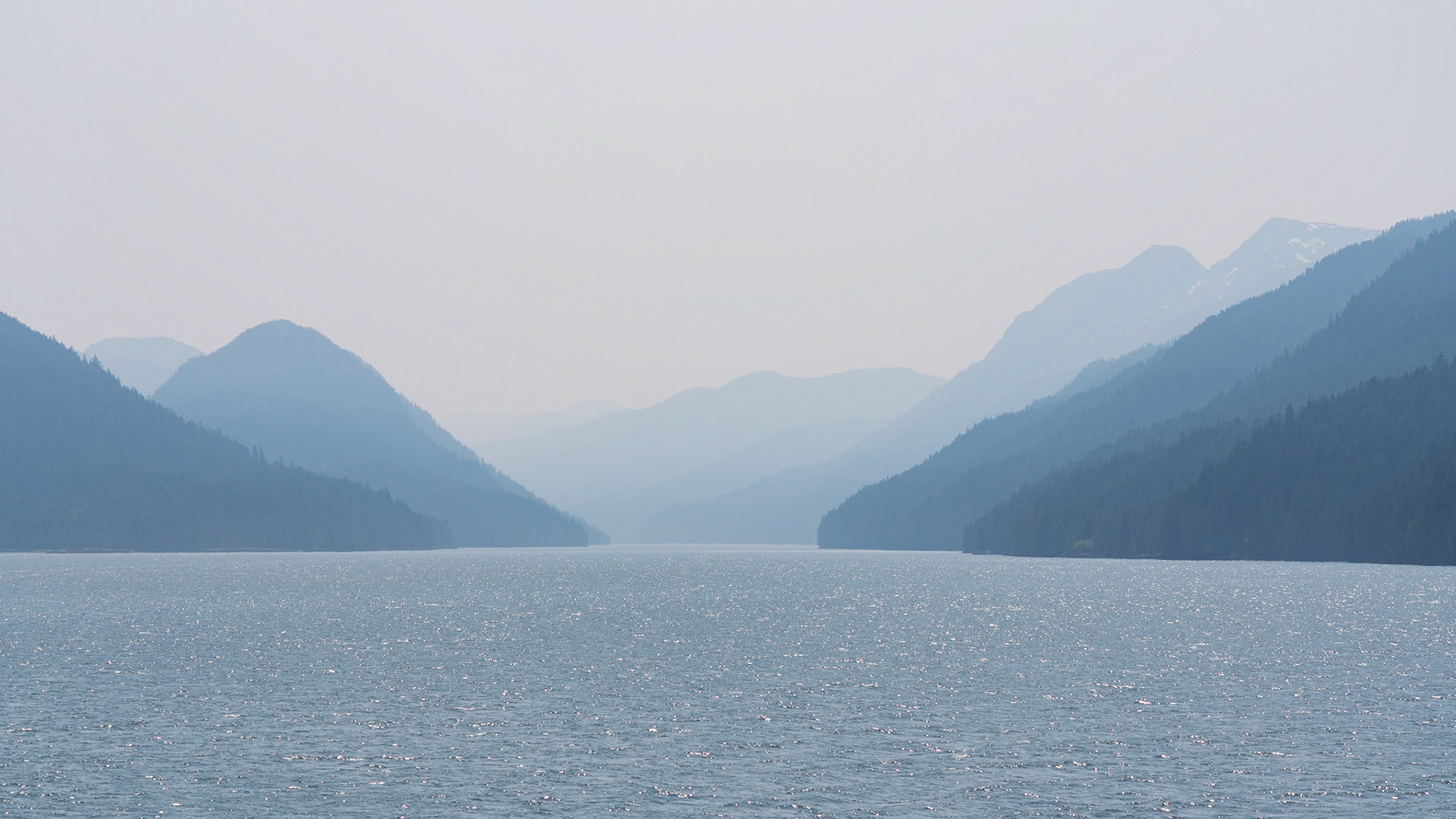 Clear skies and hazy air, thanks to bush fires inland. Cruising the inside passge to Prince Rupert.