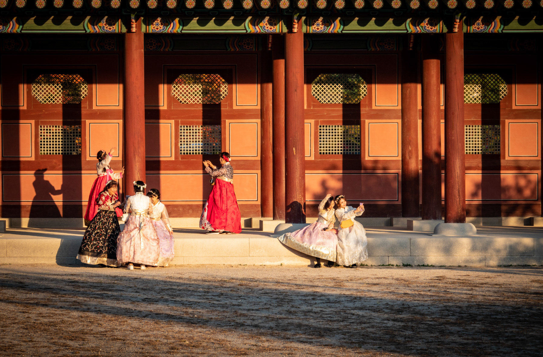 Women taking selfies at Gyonbeokgong Palace, Seoul, South Korea 2018