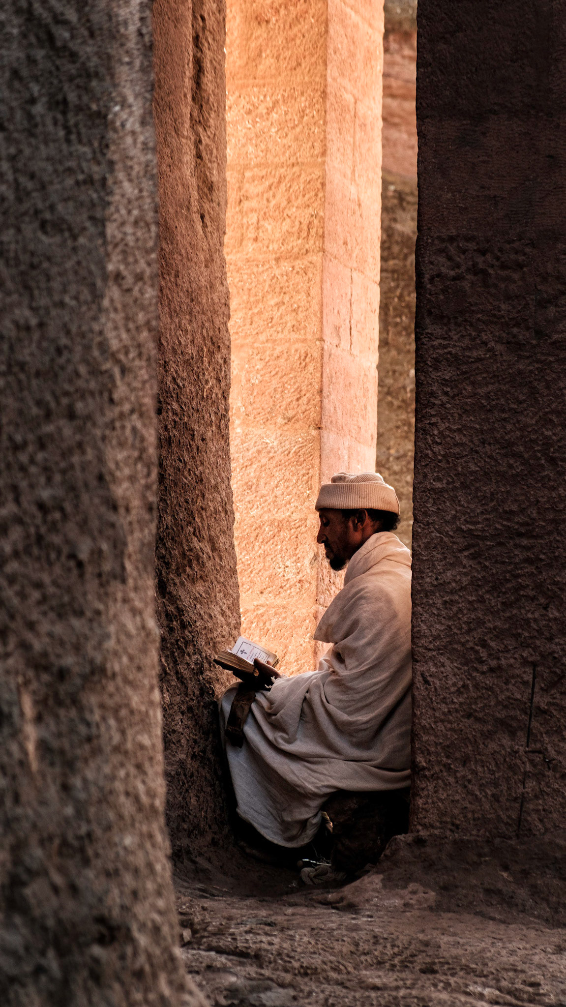 Praying at Bet Medhane Alem - Lalibela, Ethiopia