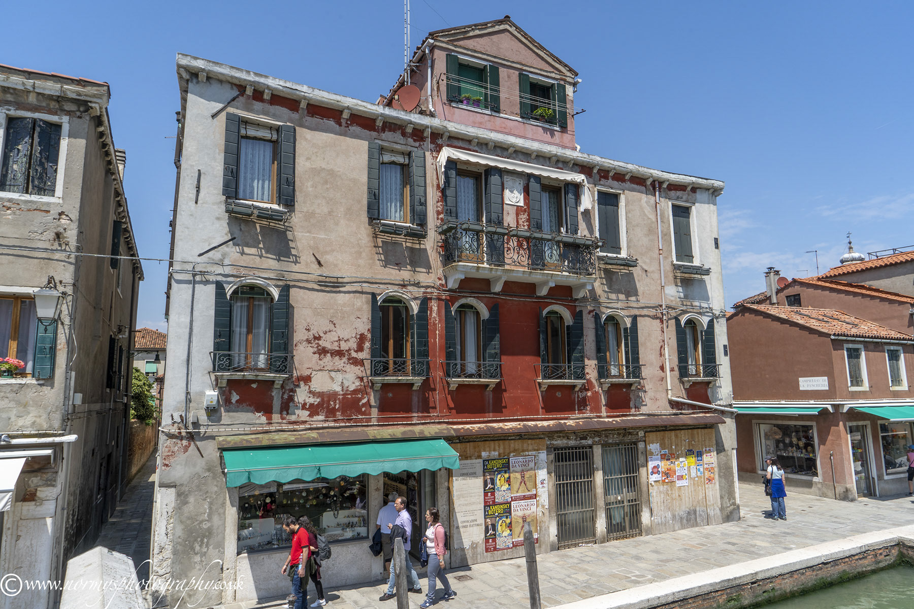 Buildings are certainly not as colourful as Burano.