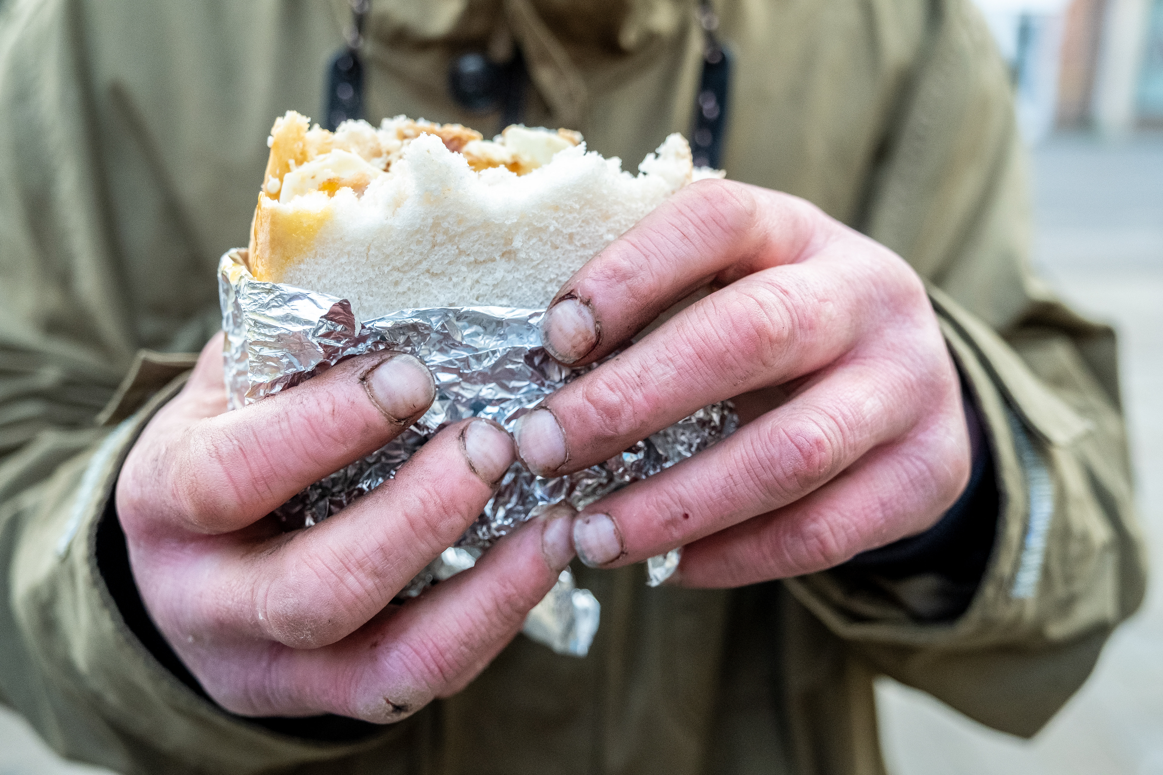 Day 11 of Lockdown- A rough sleeper eating breakfast at the Archer Project