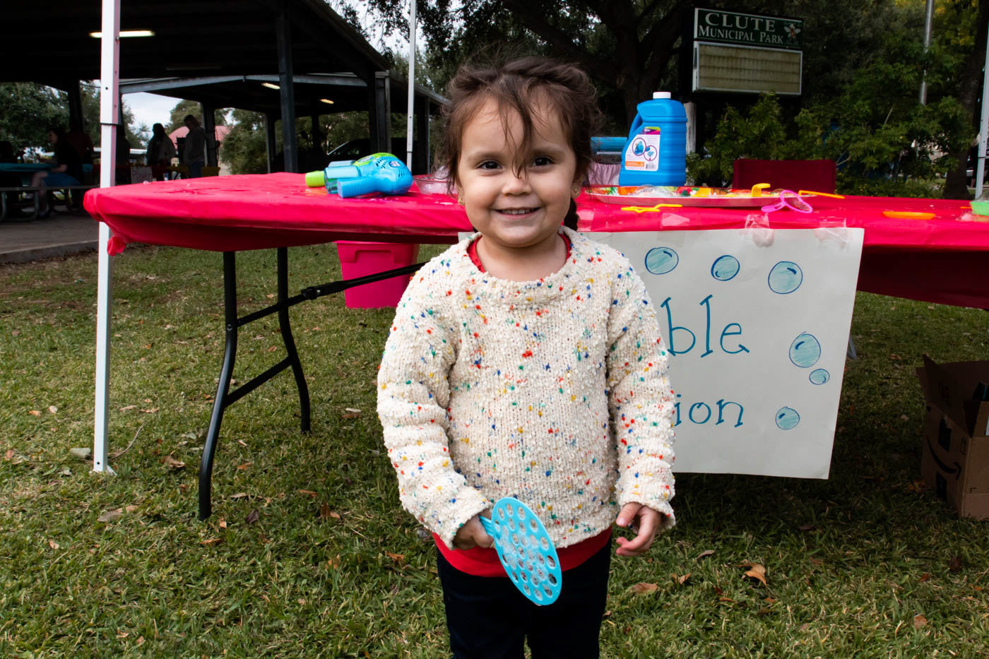 Isabella Ortiz, age 2, plays with bubbles at the Teddy Bear Carnival held at Clute Municipal Park on November 17, 2019.