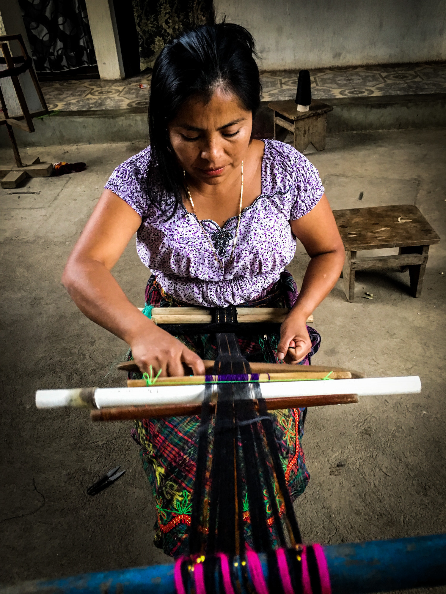 Chusita at work on the belt-loom