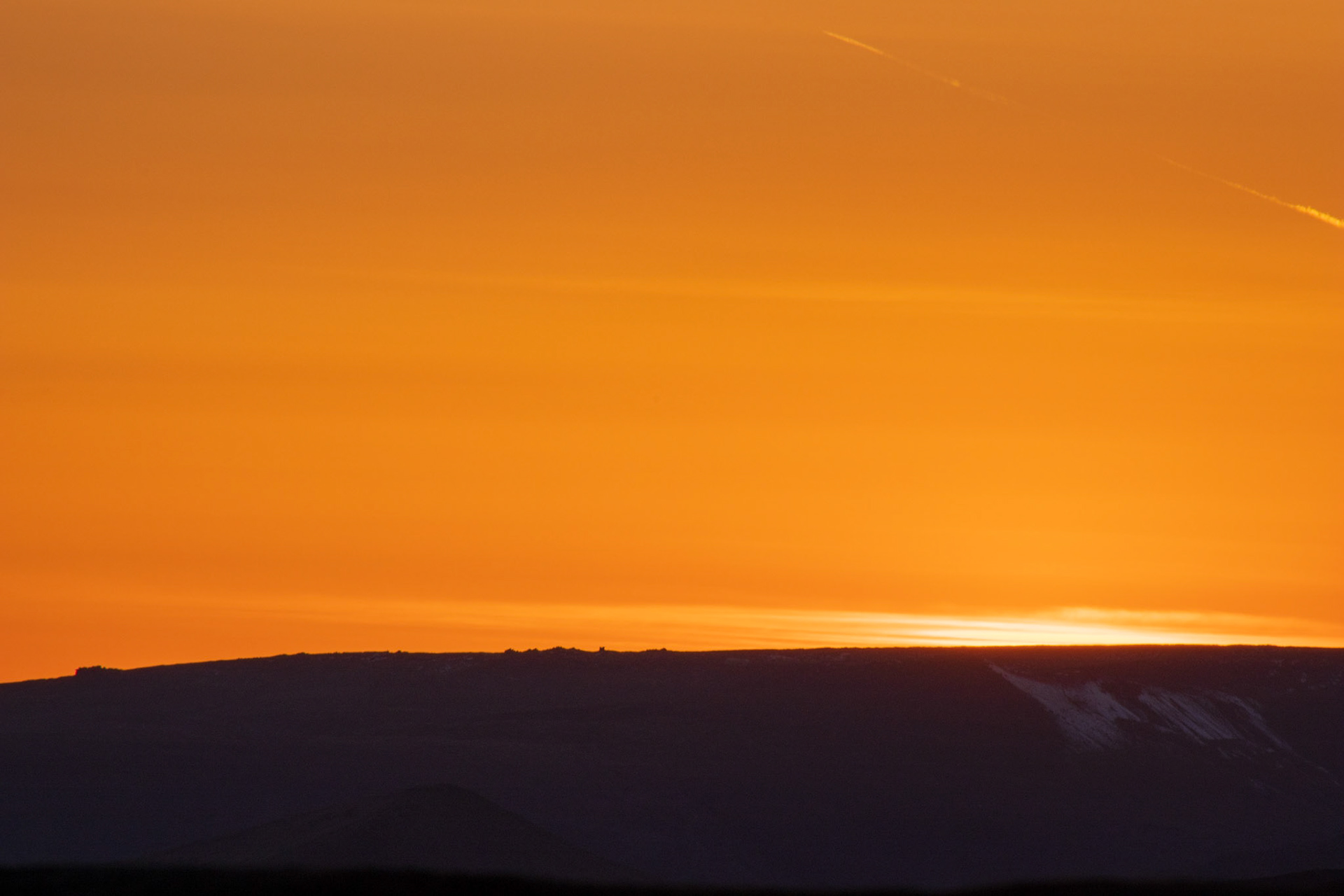 Last rays of the day setting creating a wonderful Orange hue in the sky