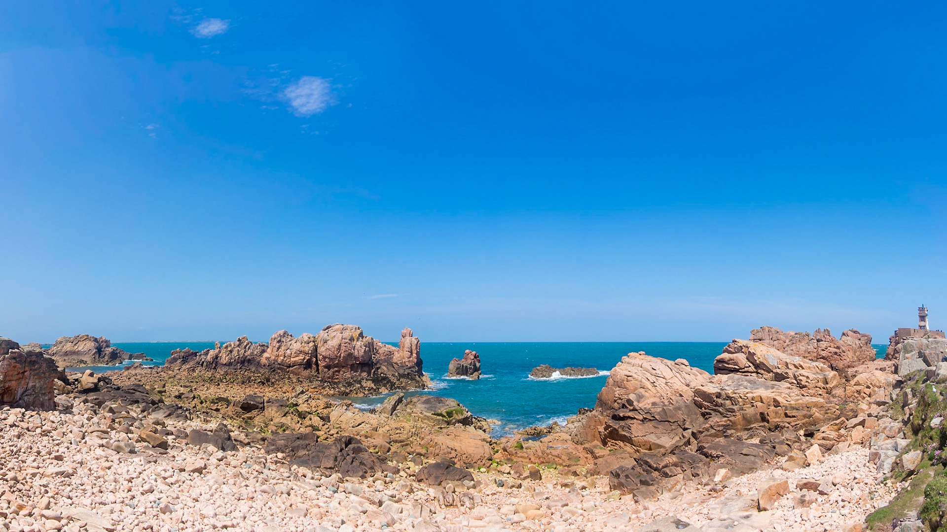 A random rock formation off the coast of Ile de Bréhat, Bretagne, looks like a giant sleeping on its back