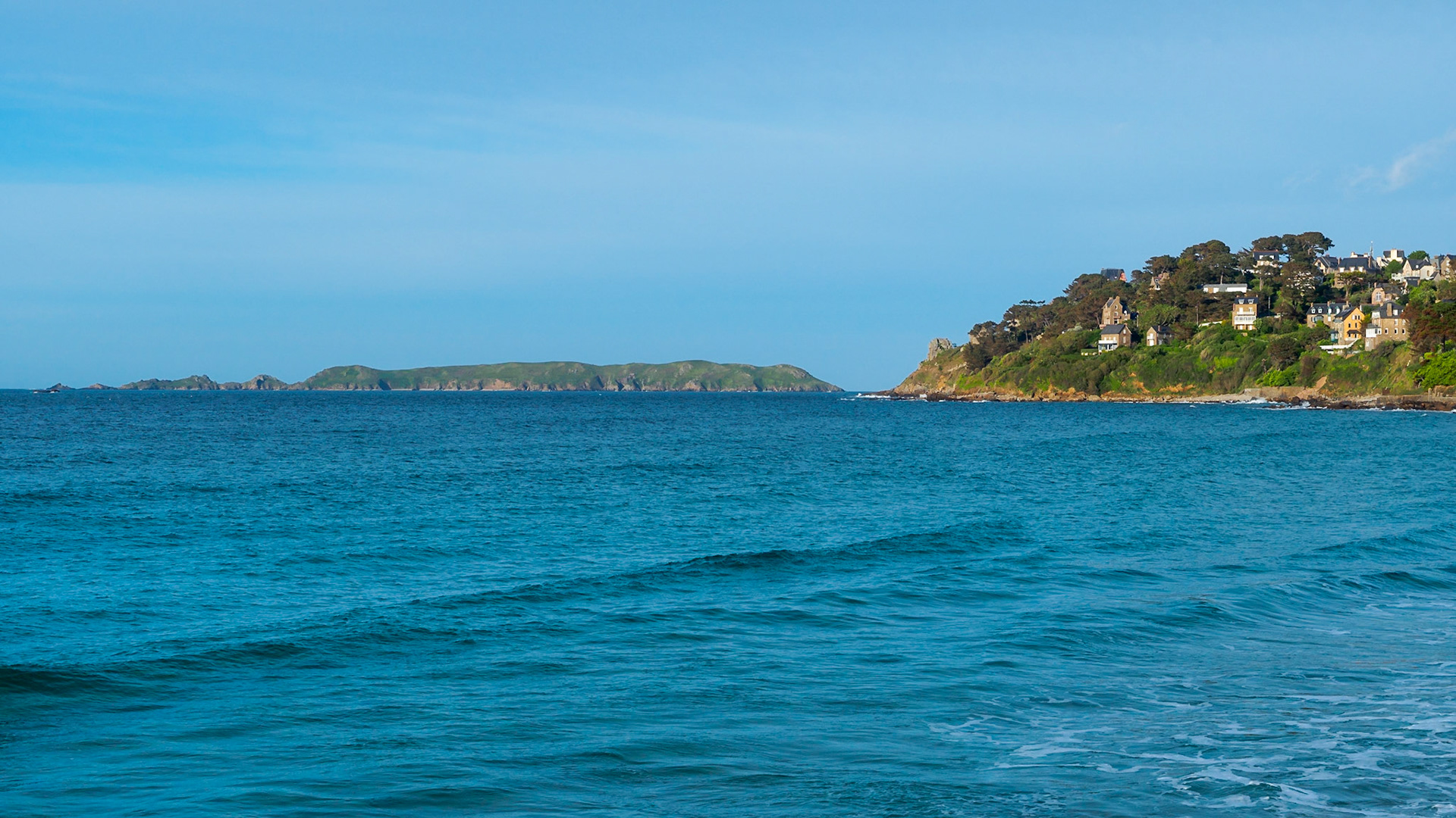 View on Ile Tomé and Perros-Guirec from the opposite side of the beach of Testrahou.