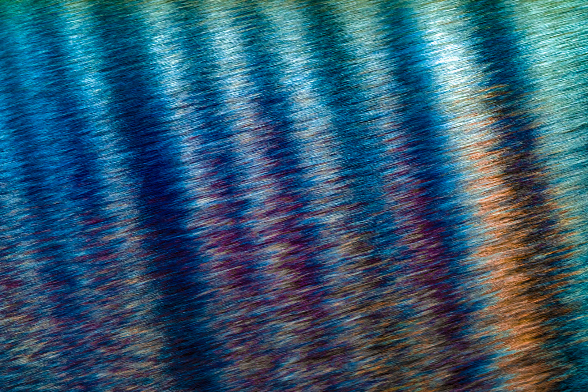 Blue striped rippled water surface