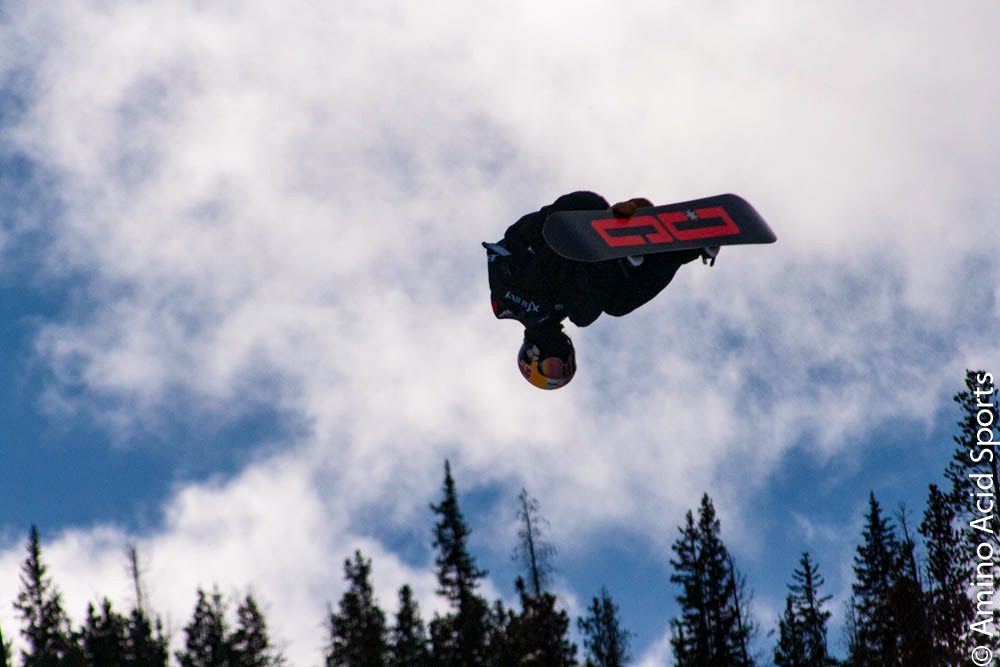Toby Miller cuts through the cold December air on his back in the halfpipe
