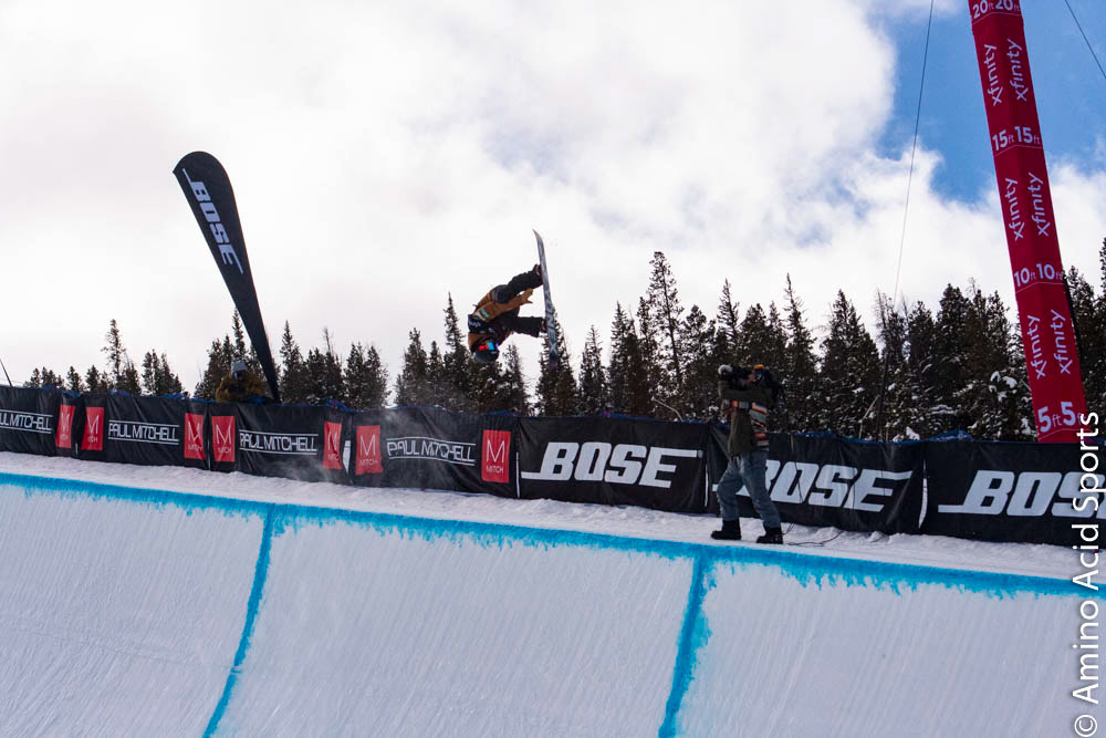 Nippon's Yuto Totsuka soars outta the halfpipe right wall on his spin of his Yonex board