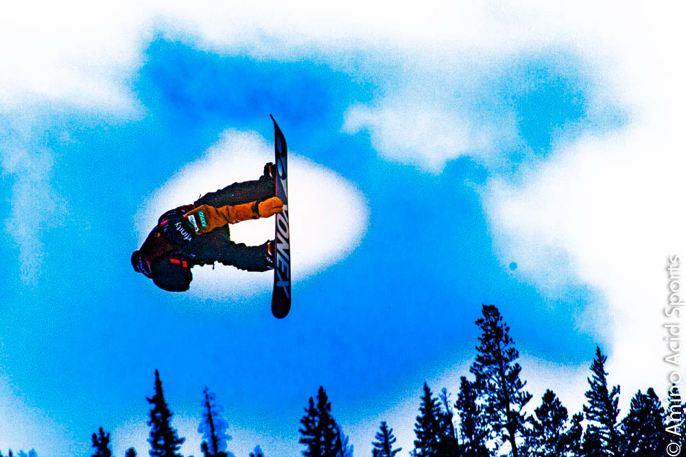 Nippon proud Yuto Totsuka flies outta the halfpipe right wall on his mute grab of his Yonex board