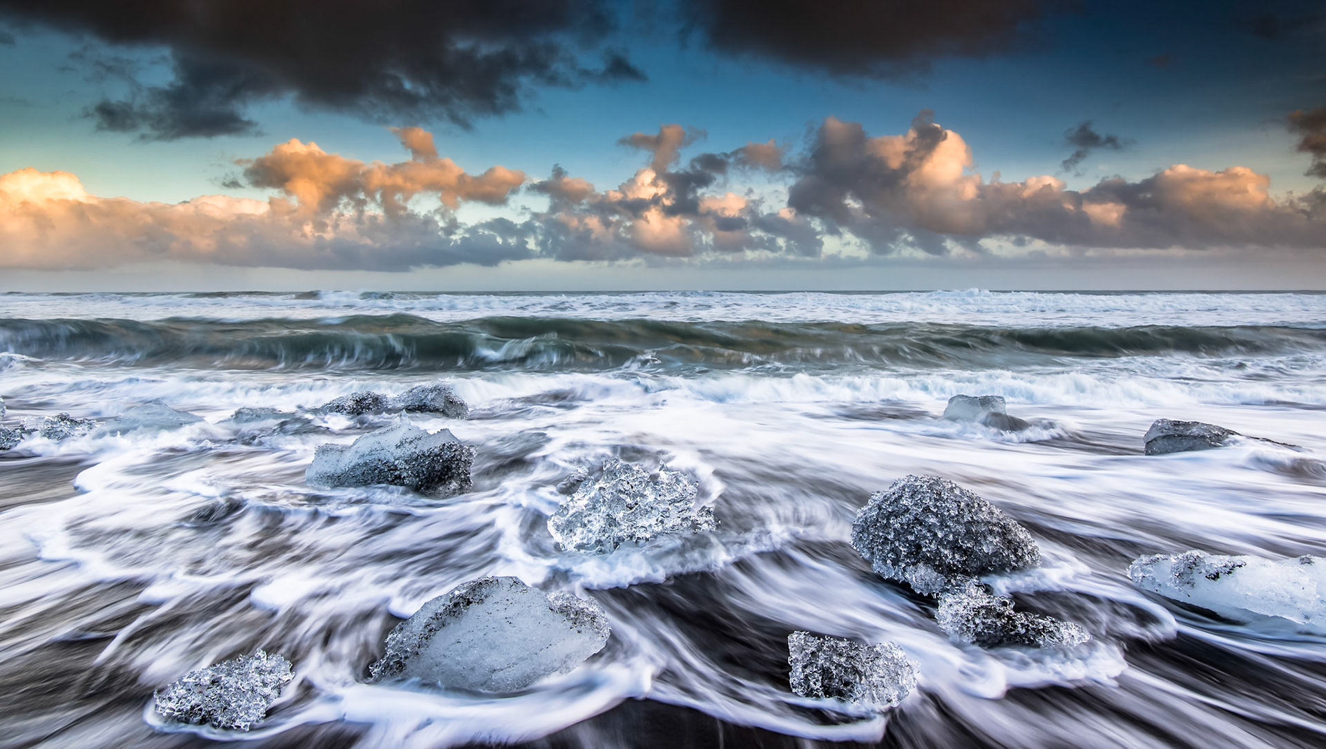 Sunrise time in Diamond Beach, near Jökulsárlón glacial lagoon, Iceland.