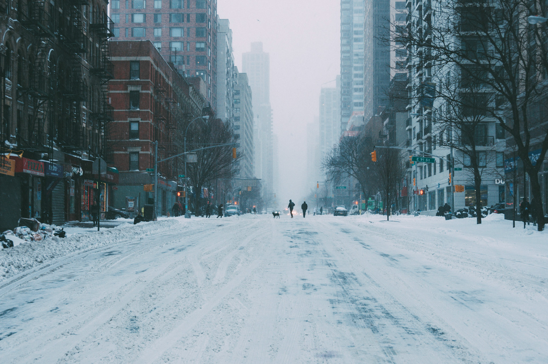 The streets are full of snow and clear of cars after a snowstorm in Yorkville, Manhattan.