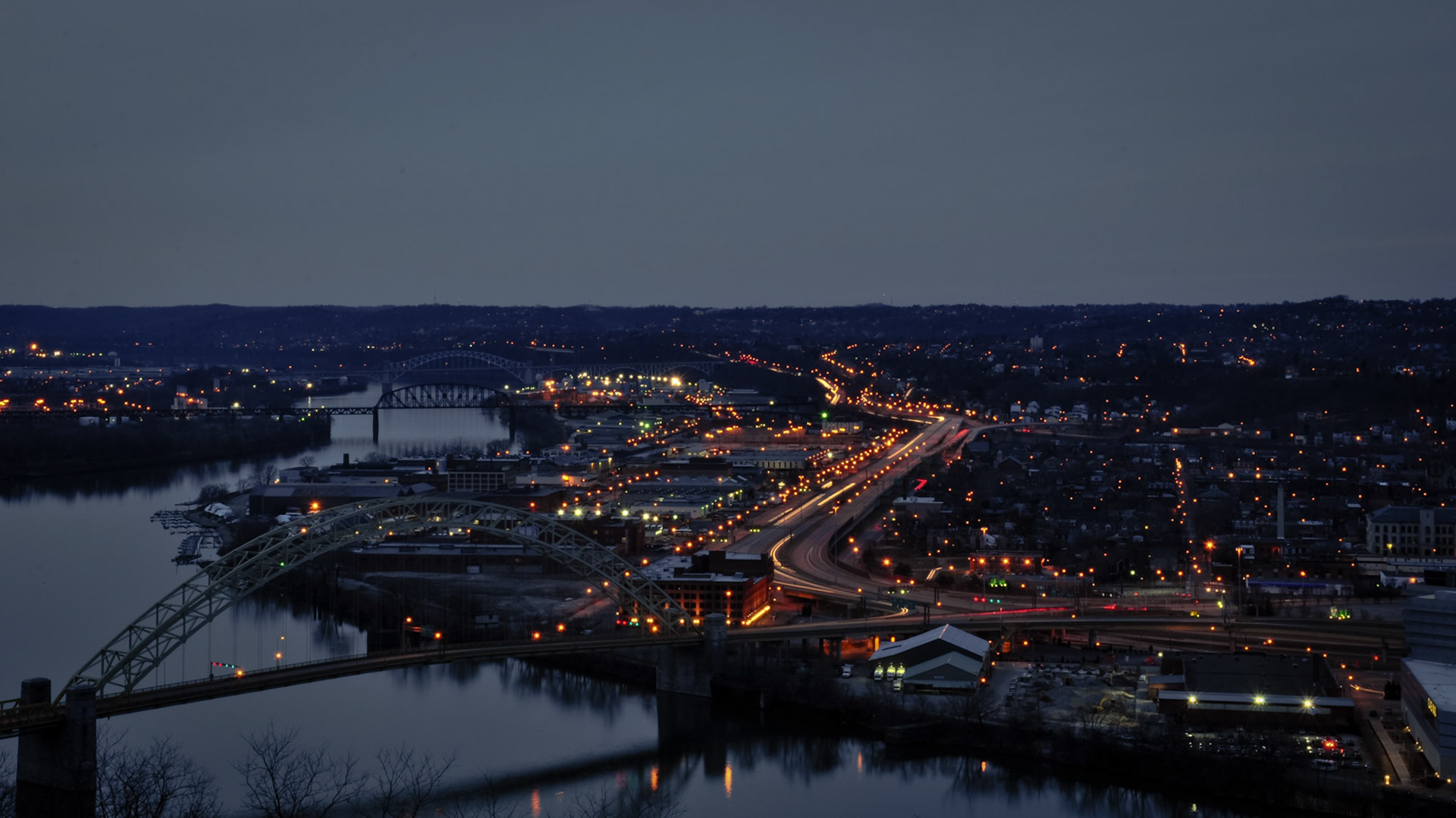 This photo was taken from Duquesne Heights. The three bridges crossing the Ohio are (from nearest to farthest) the West End Bridge, Ohio Railroad Connecting Bridge and McKees Rocks Bridge.