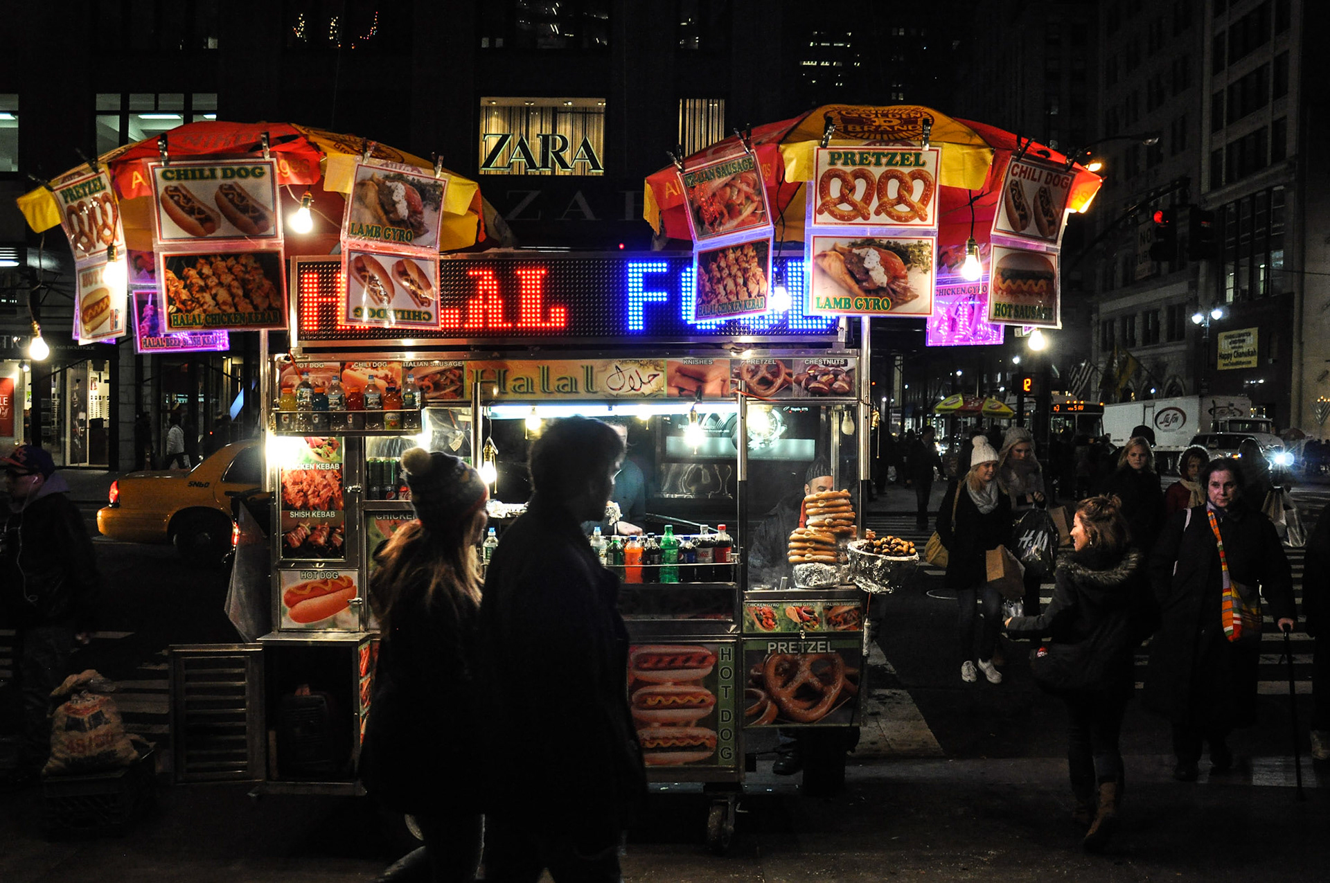 Street food is popular in NYC, even in the winter.  This cart looked especially colorful this night.  

12/2013