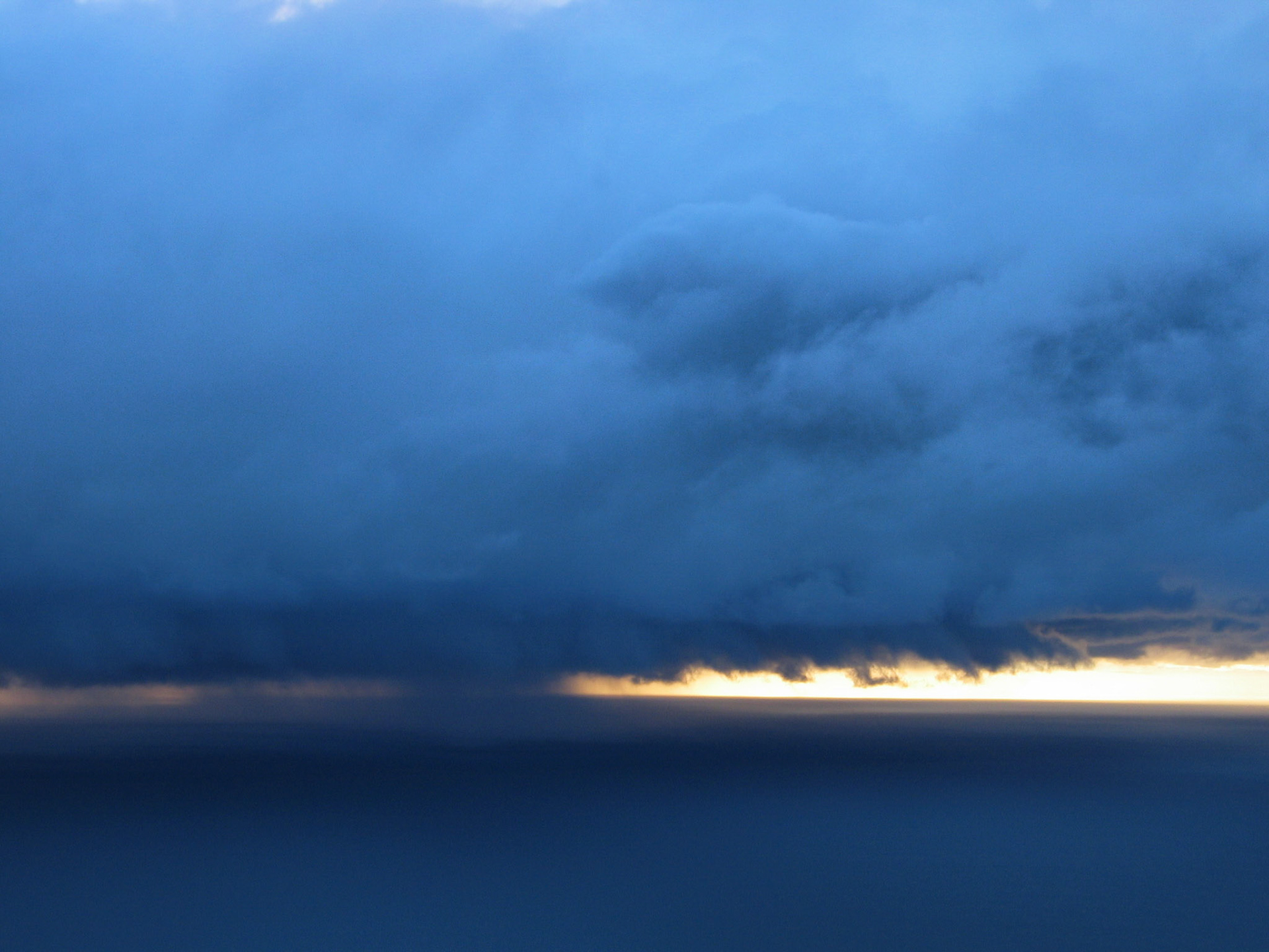 On Lake Titicaca, at 4000 meters of altitude you get to see some incredible views. Here a storm approaches Isla Amantani at dawn.