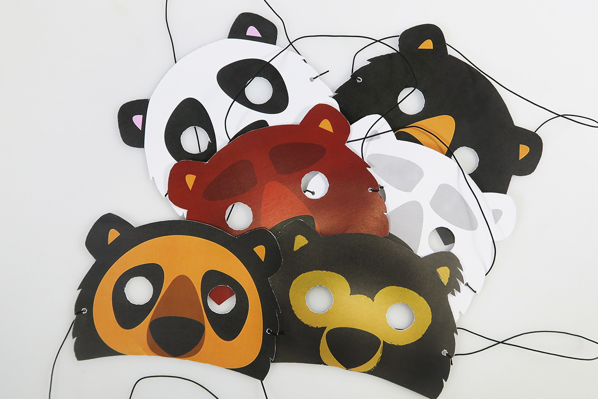 bear face mask for children which you cut out from packaging designed by melissa carne