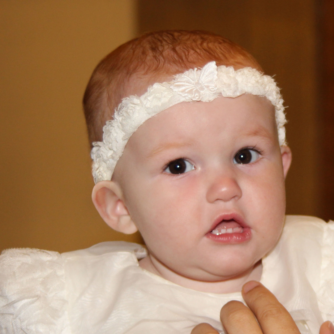 Retouched ear folded under headband