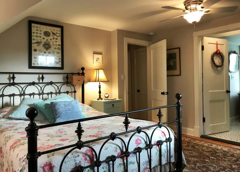 The master bedroom has a queen bed and full bath.